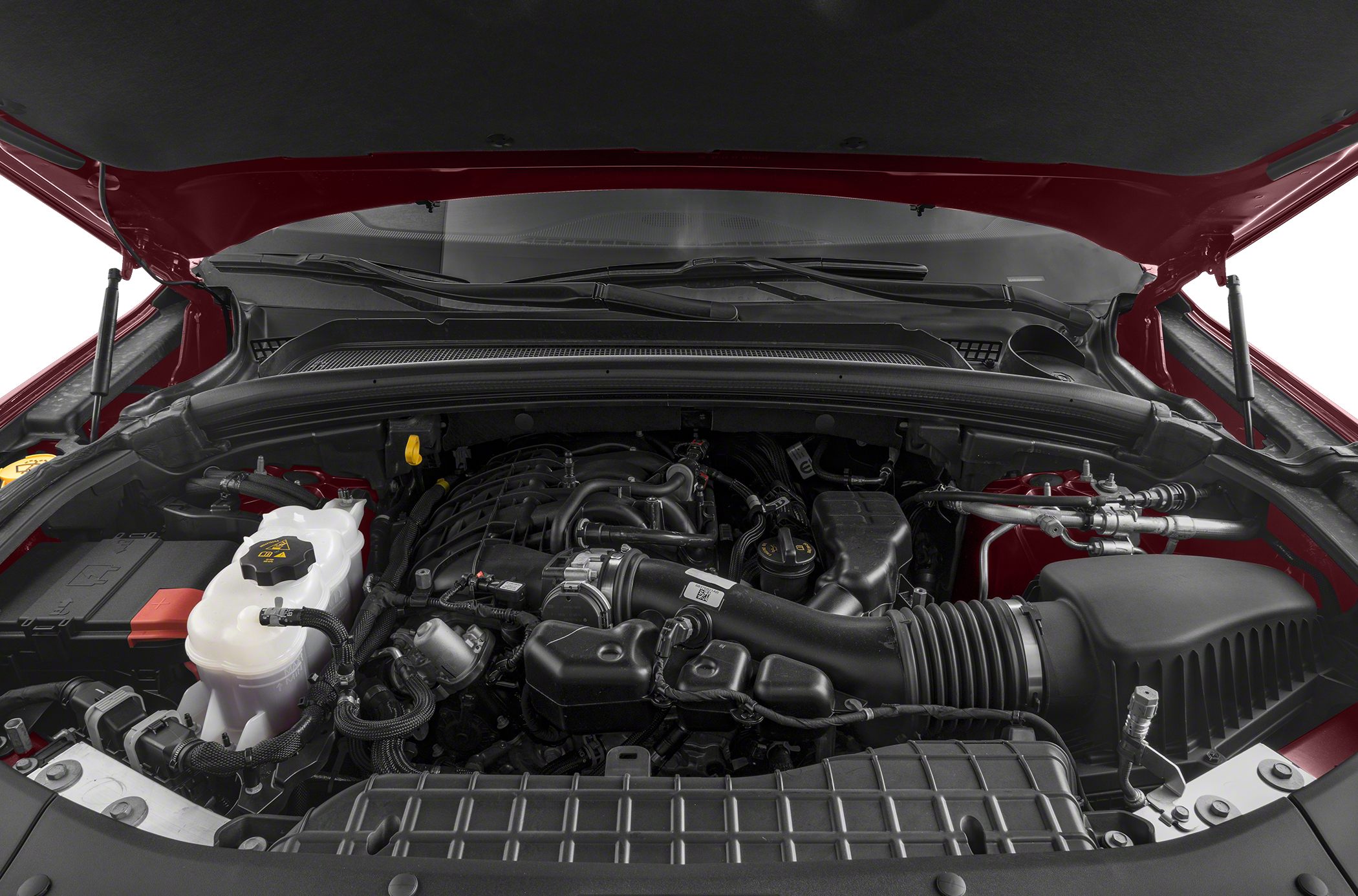 Modern engine bay with intake system and fluid reservoir