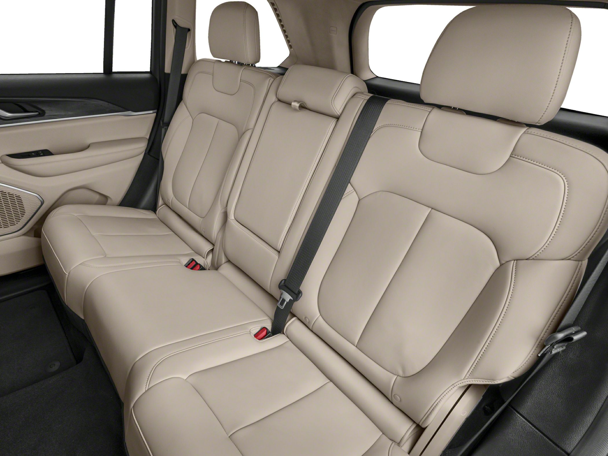 Beige leather rear seats with integrated headrests and seatbelt