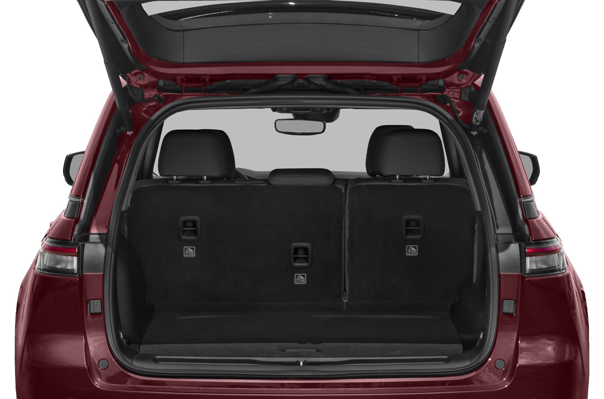 Spacious rear cargo area with upright rear seats in SUV trunk