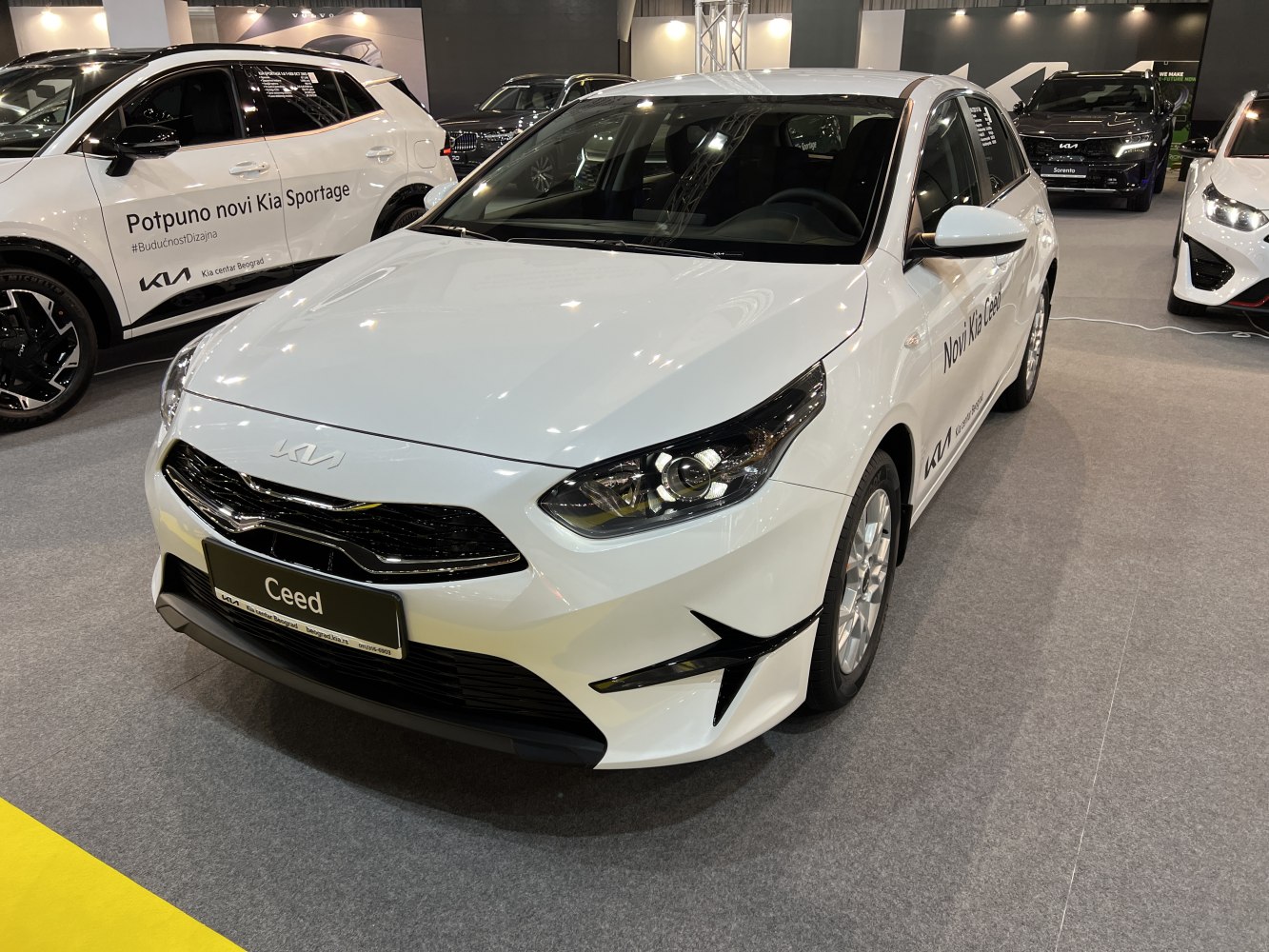 Front and side exterior featuring LED headlights and updated grille design.