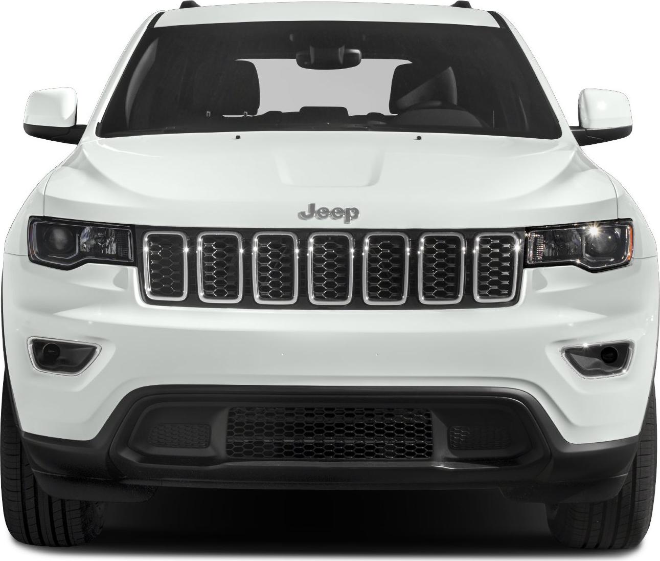 Front view of a white SUV with signature grille and headlights