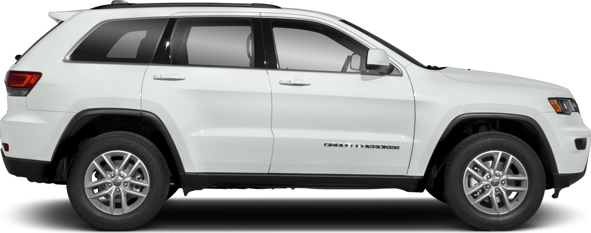 White SUV side profile with alloy wheels and four doors