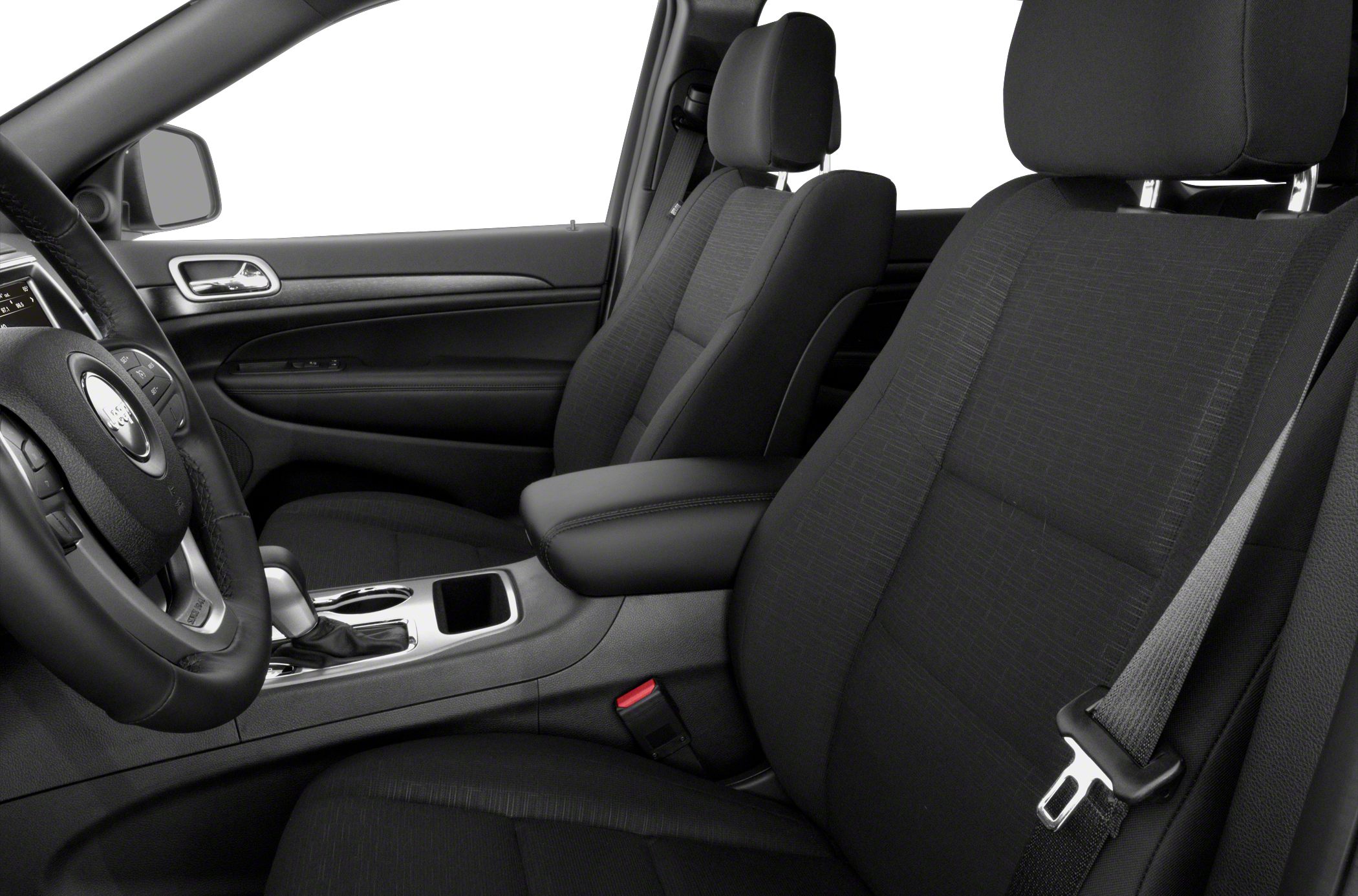 Front seats, dashboard, and seat belts inside vehicle