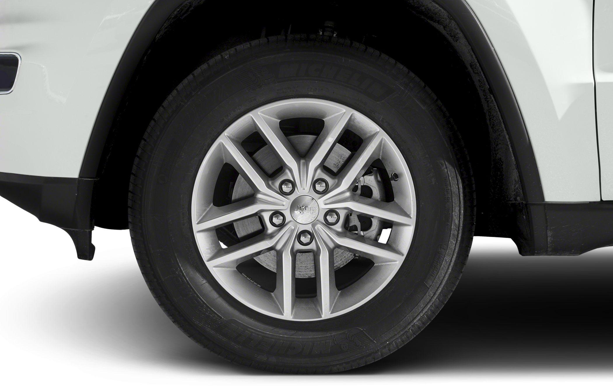 Close-up of an alloy wheel and tire with disc brake