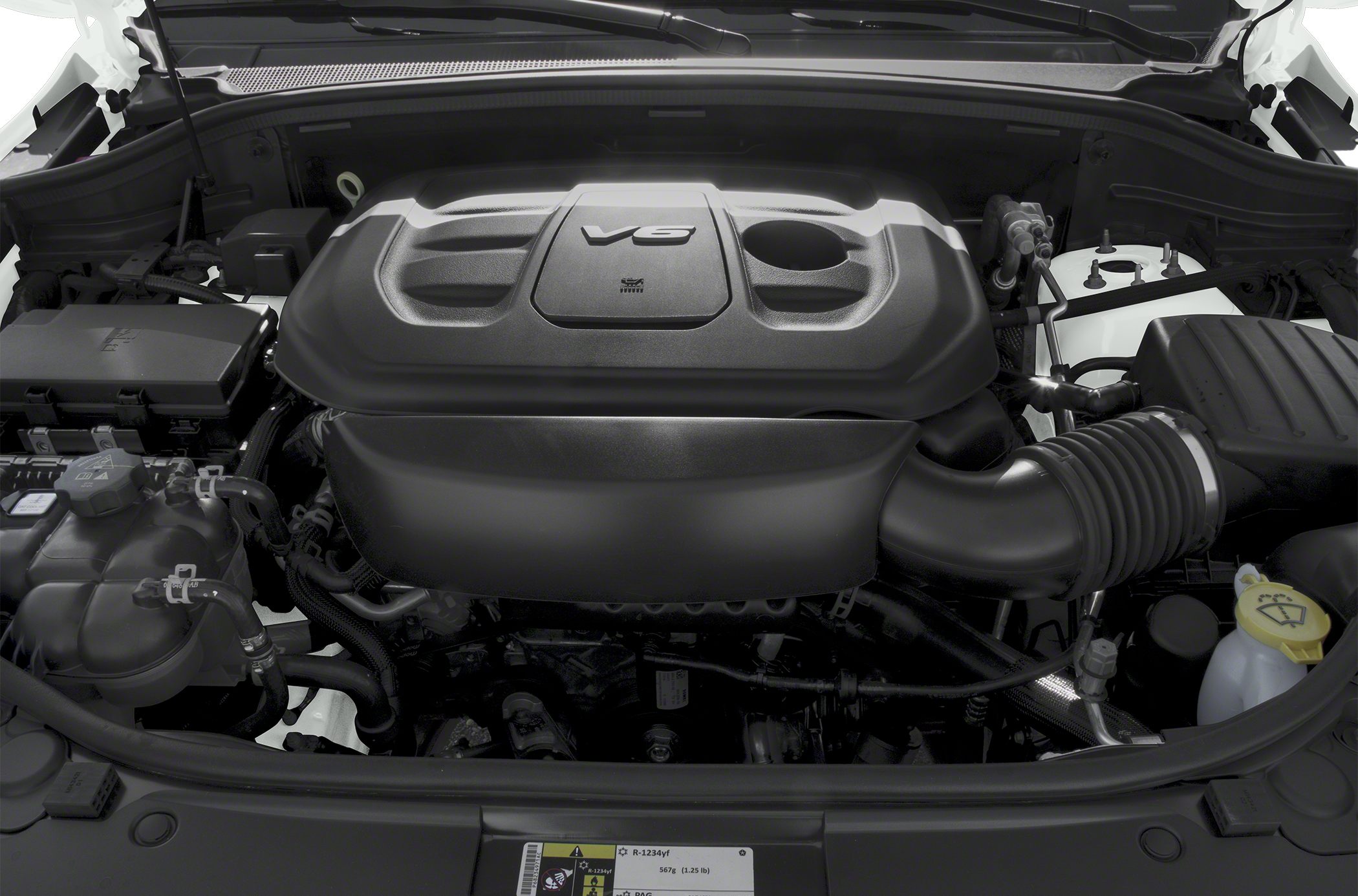 V6 engine with cover and components in engine bay