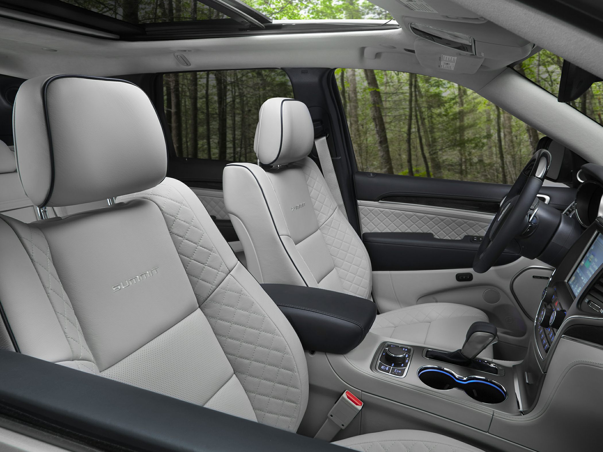 Premium quilted leather seats and center console with gear shifter and controls