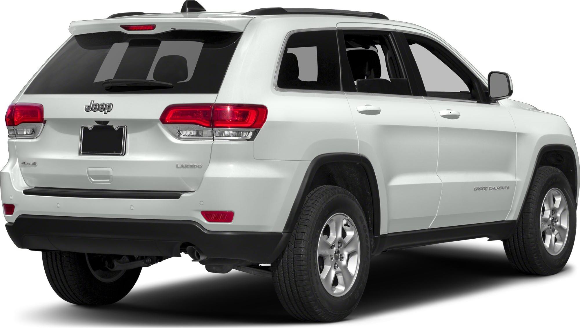 White SUV rear view with 4x4 badge and Laredo trim