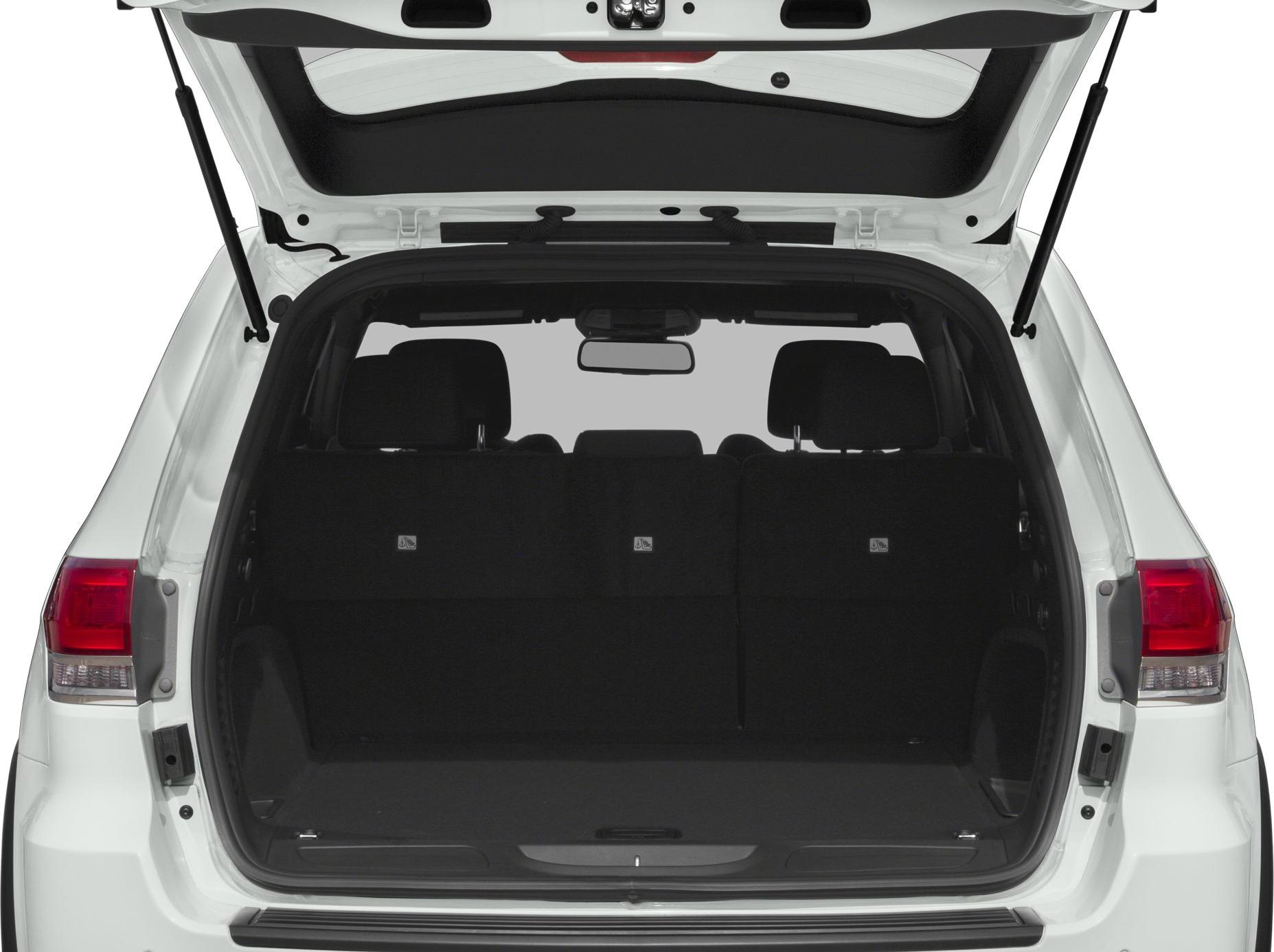 Open rear cargo space with folded seats and large trunk area