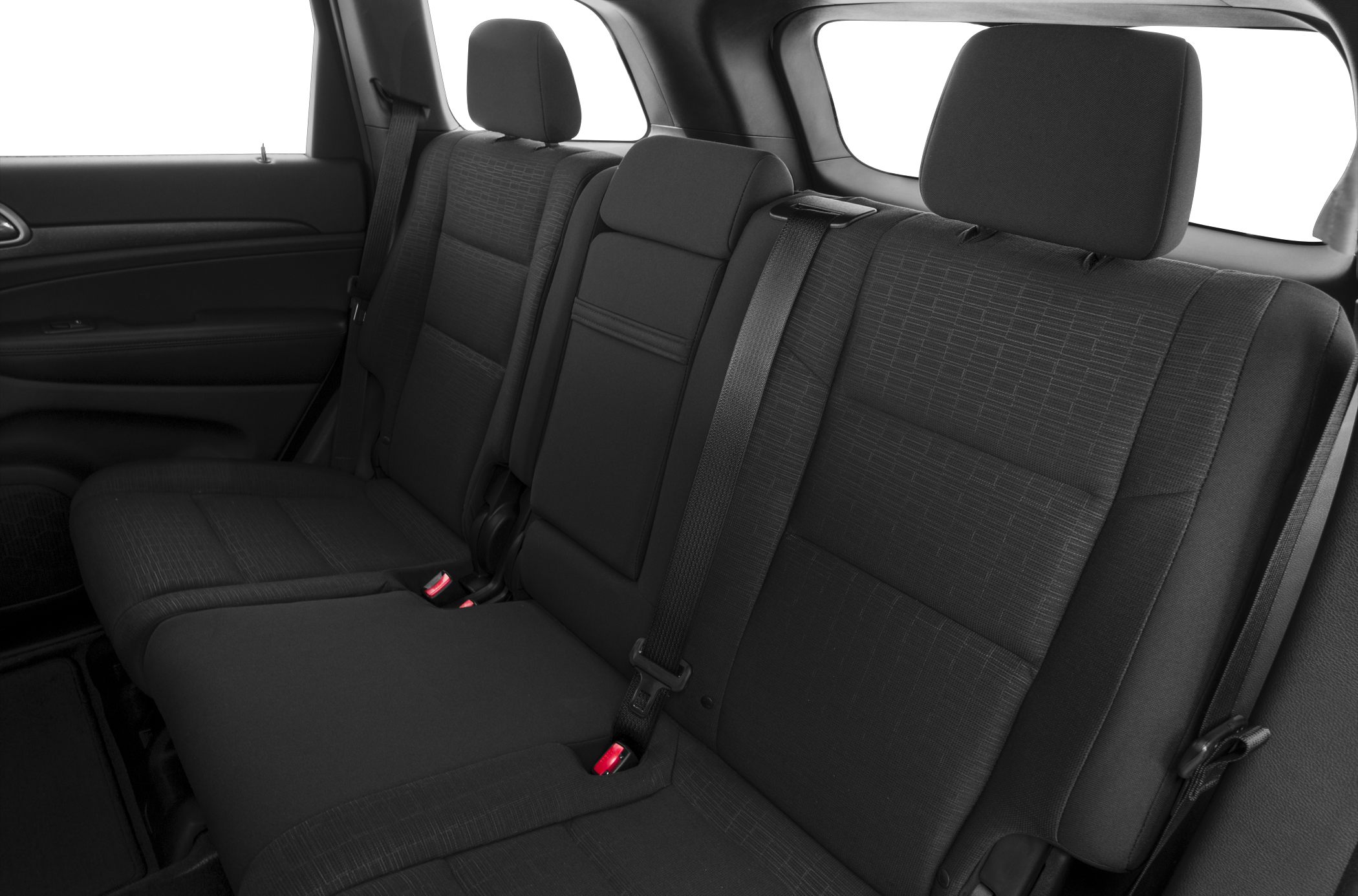 Rear seat with black fabric upholstery and seatbelts