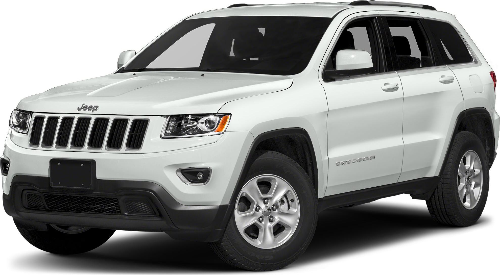 White SUV front side view with alloy wheels and seven-slot grille