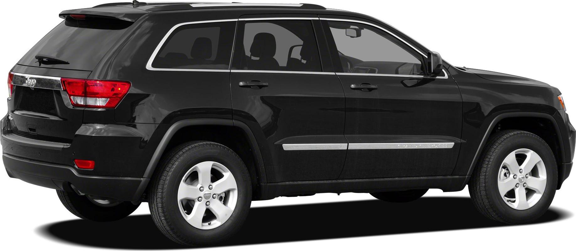 Side profile of mid-size SUV with alloy wheels and roof rails