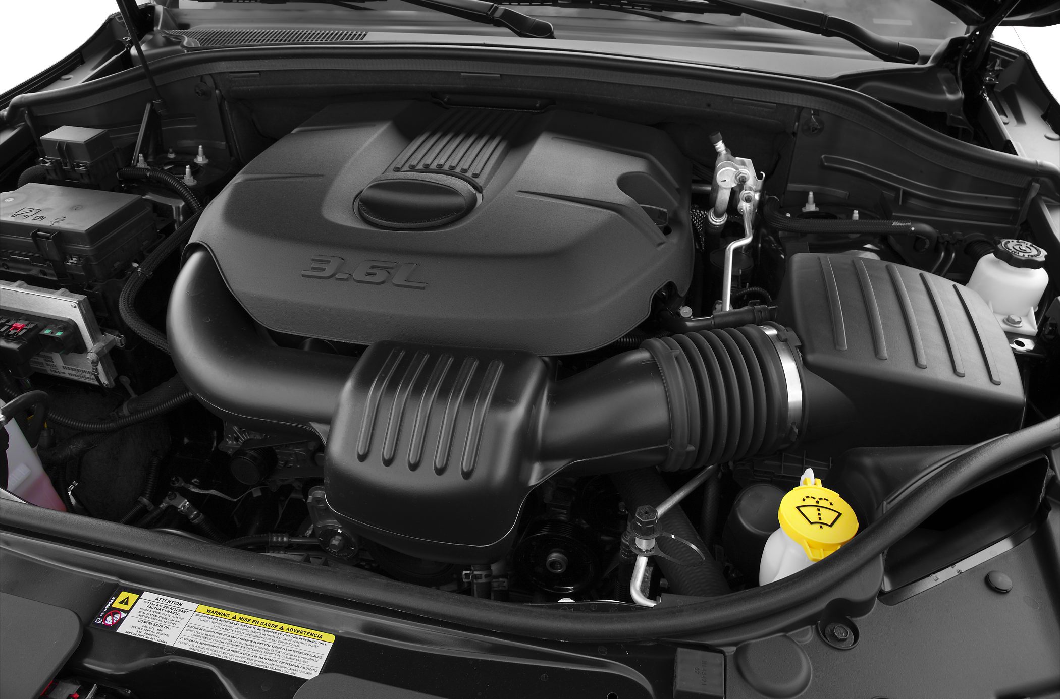 3.6L engine with air intake and engine cover in vehicle hood