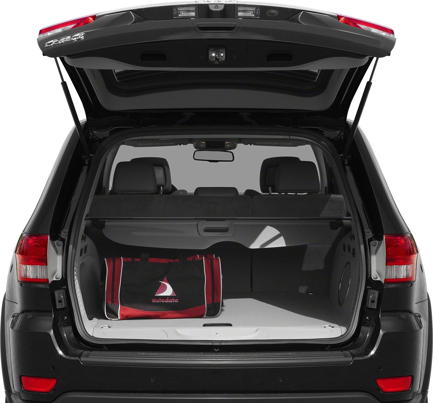 Open rear trunk with spacious cargo area and visible rear seats