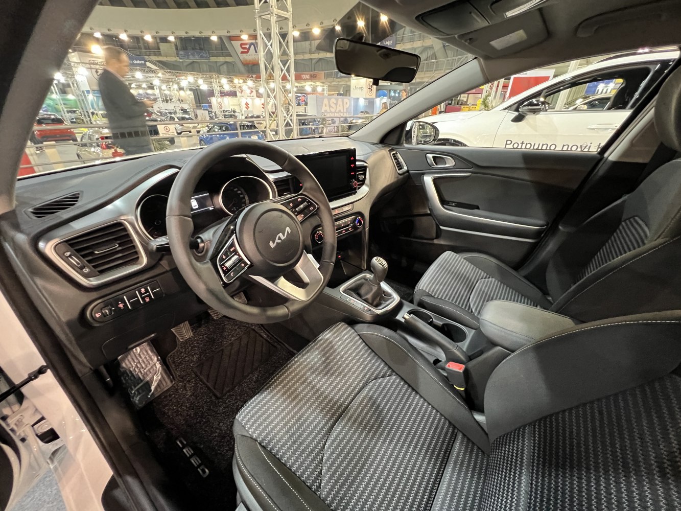 Modern car interior with manual gearbox and digital display