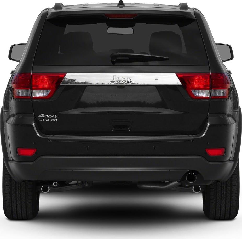 Rear view with taillights, chrome strip, rear wiper, dual exhaust
