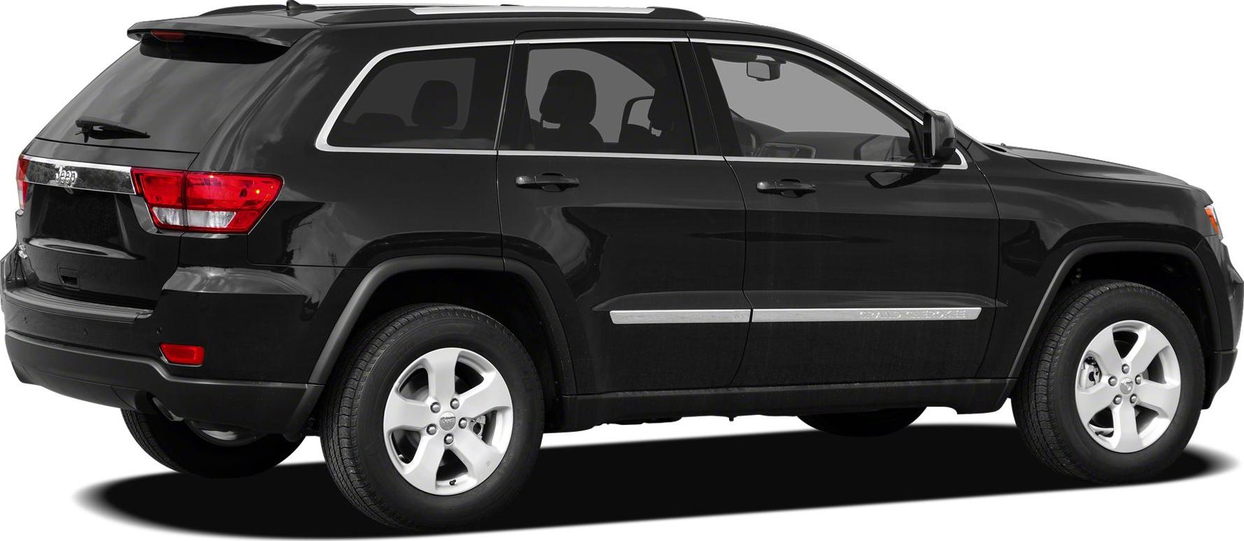 Black SUV side and rear profile with distinctive tail lights and alloy wheels