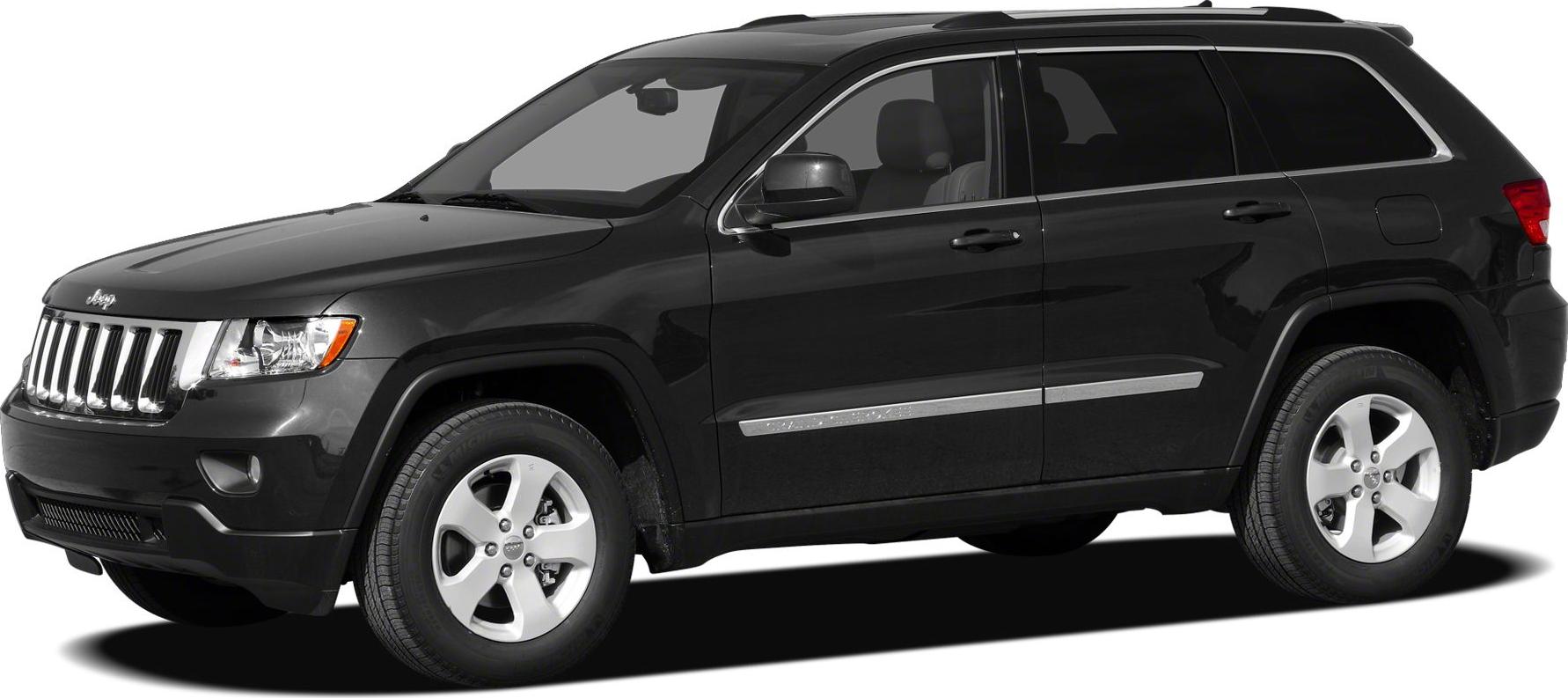 Black SUV with chrome grille and five-spoke wheels