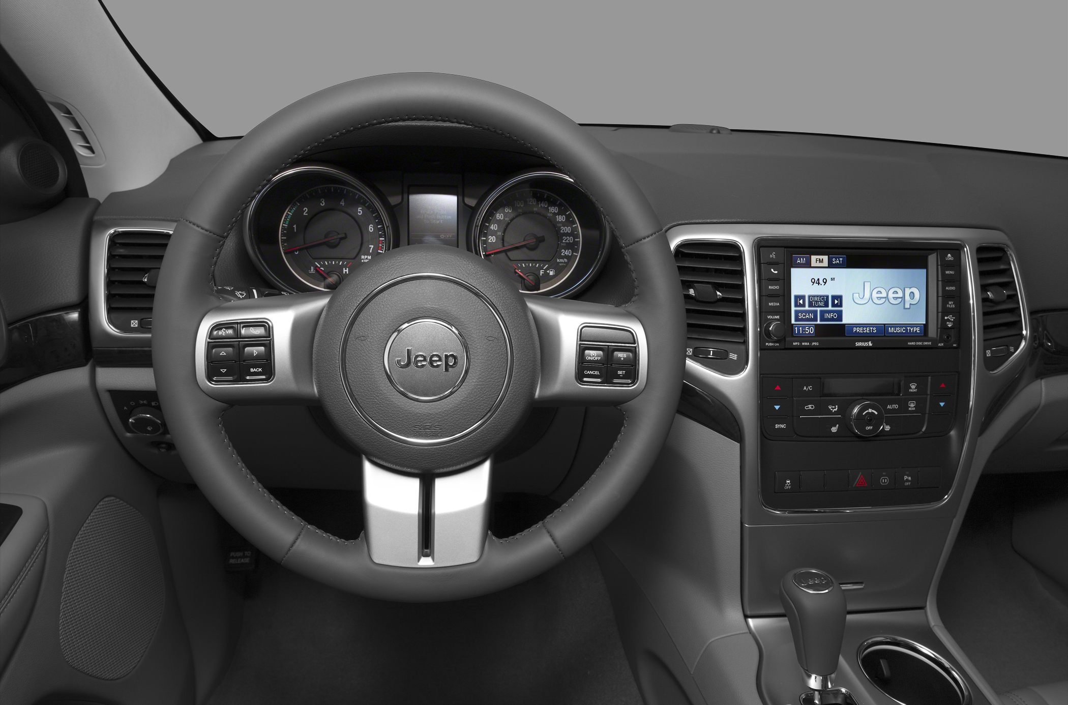 Steering wheel and dashboard with infotainment display