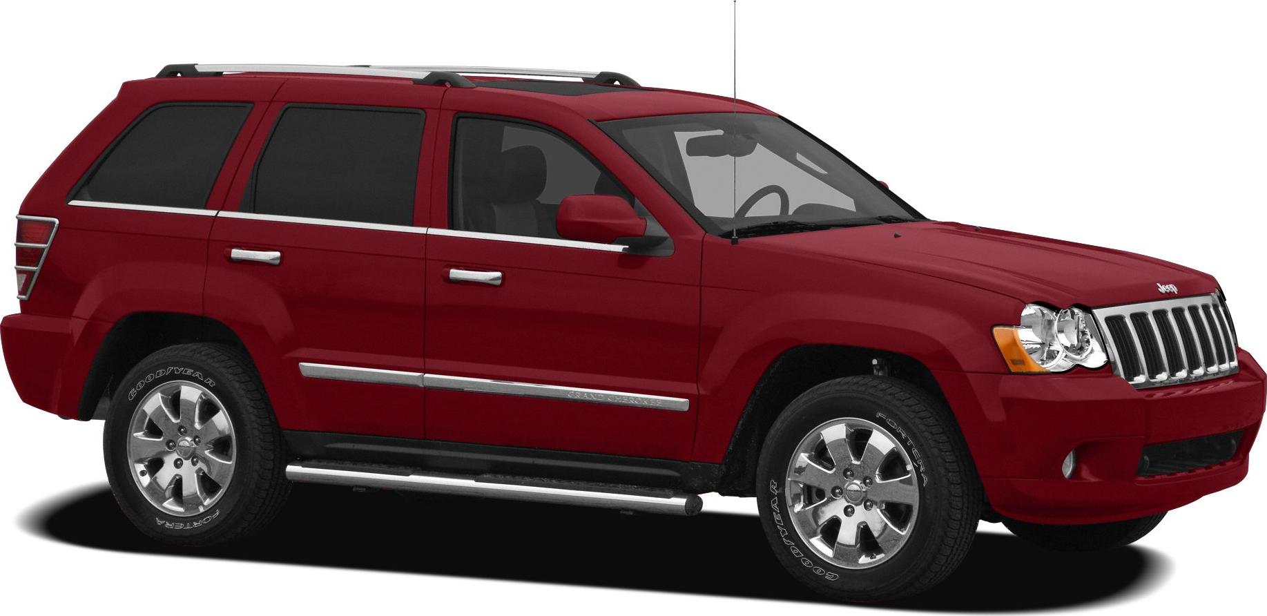 Side view of an SUV with chrome wheels and roof rails