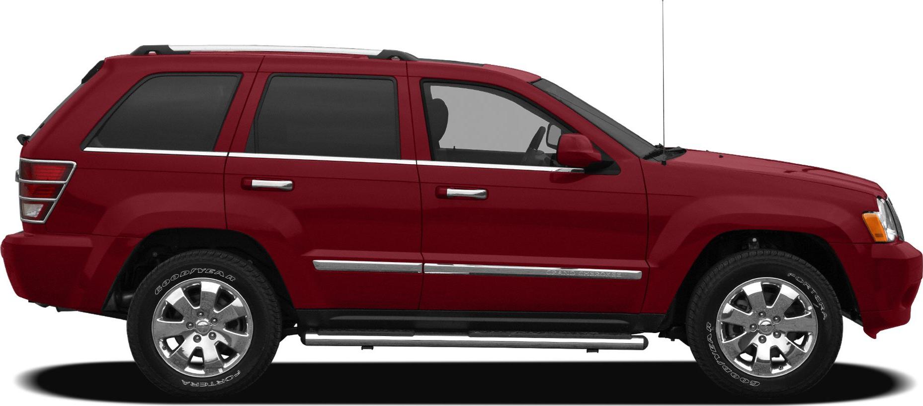 Side profile of red SUV with chrome wheels and roof rails