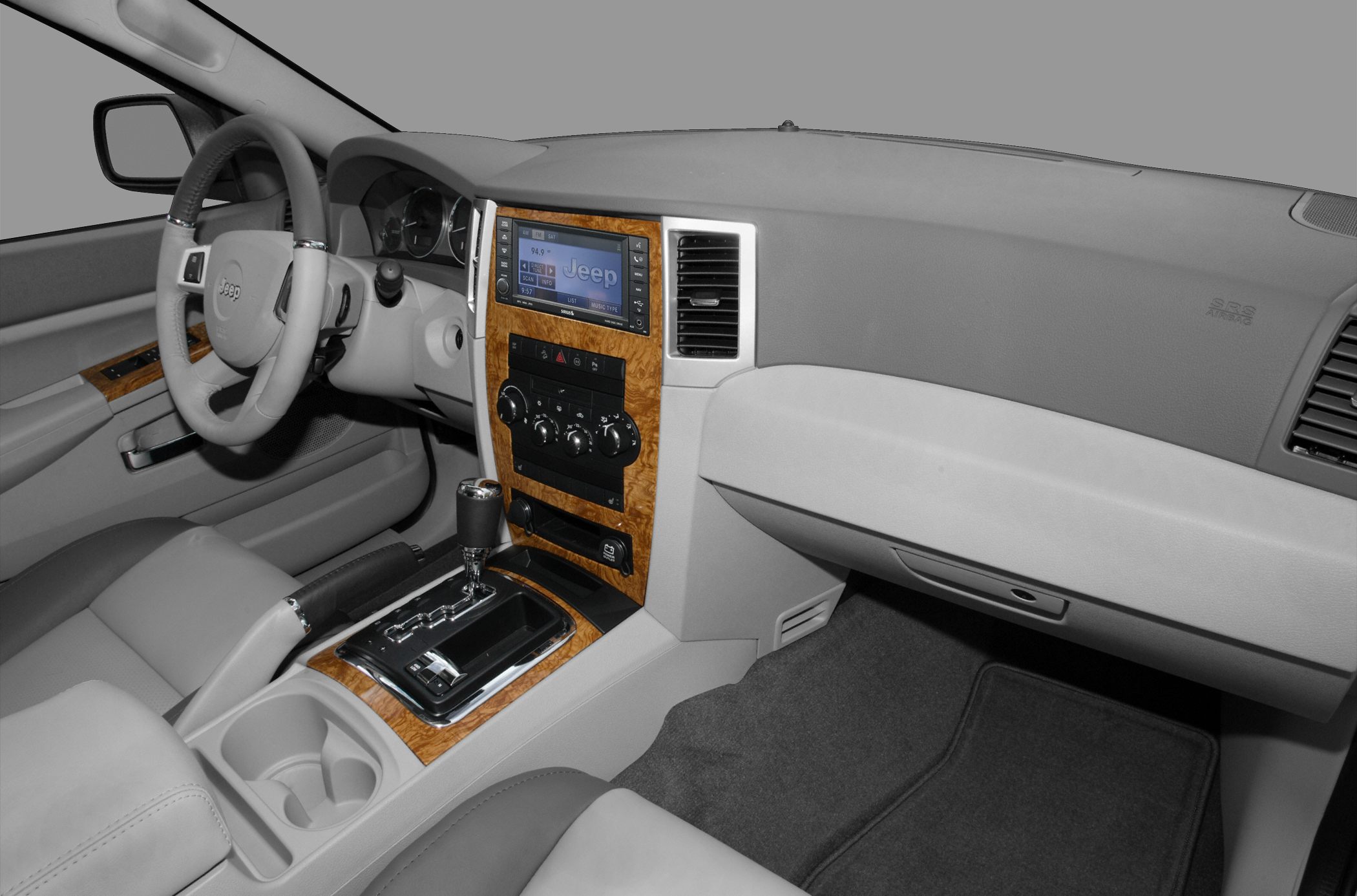 Interior dashboard and center console with wood grain trim