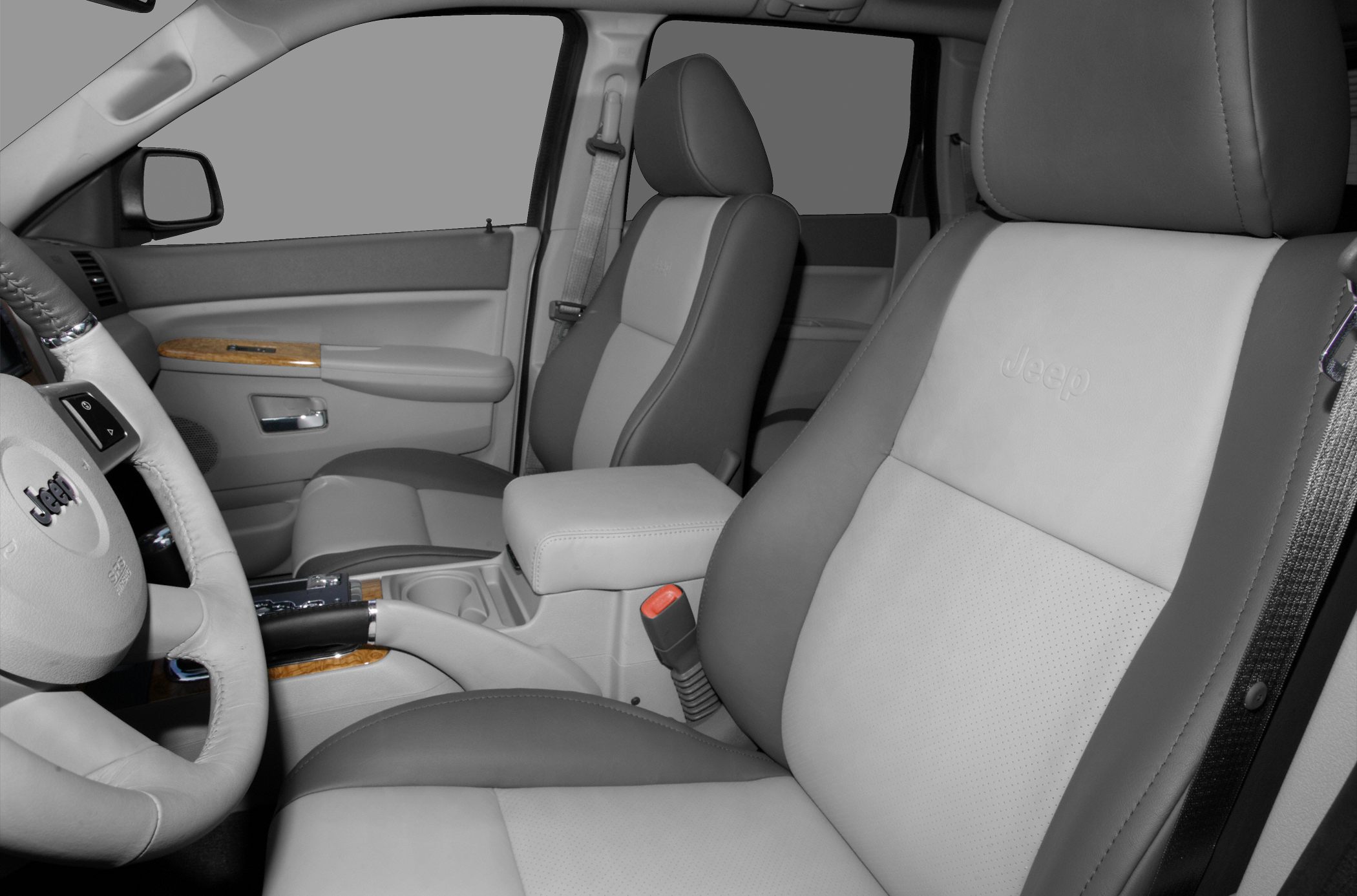 Leather seats and wood panel accents in SUV interior