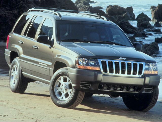 Front exterior view of a classic SUV showing grille and headlights