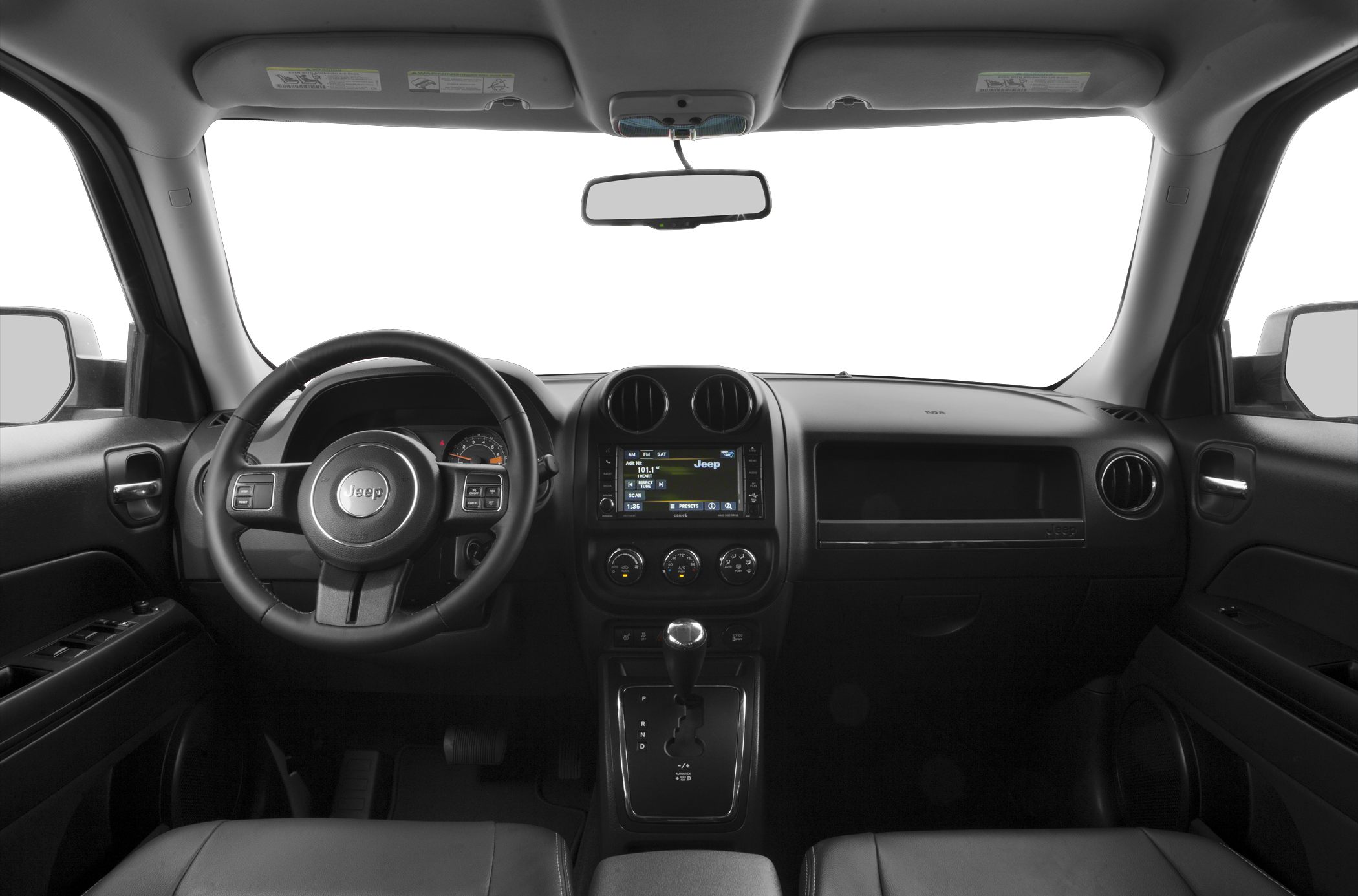 Car interior with dashboard, steering wheel, and central touchscreen display