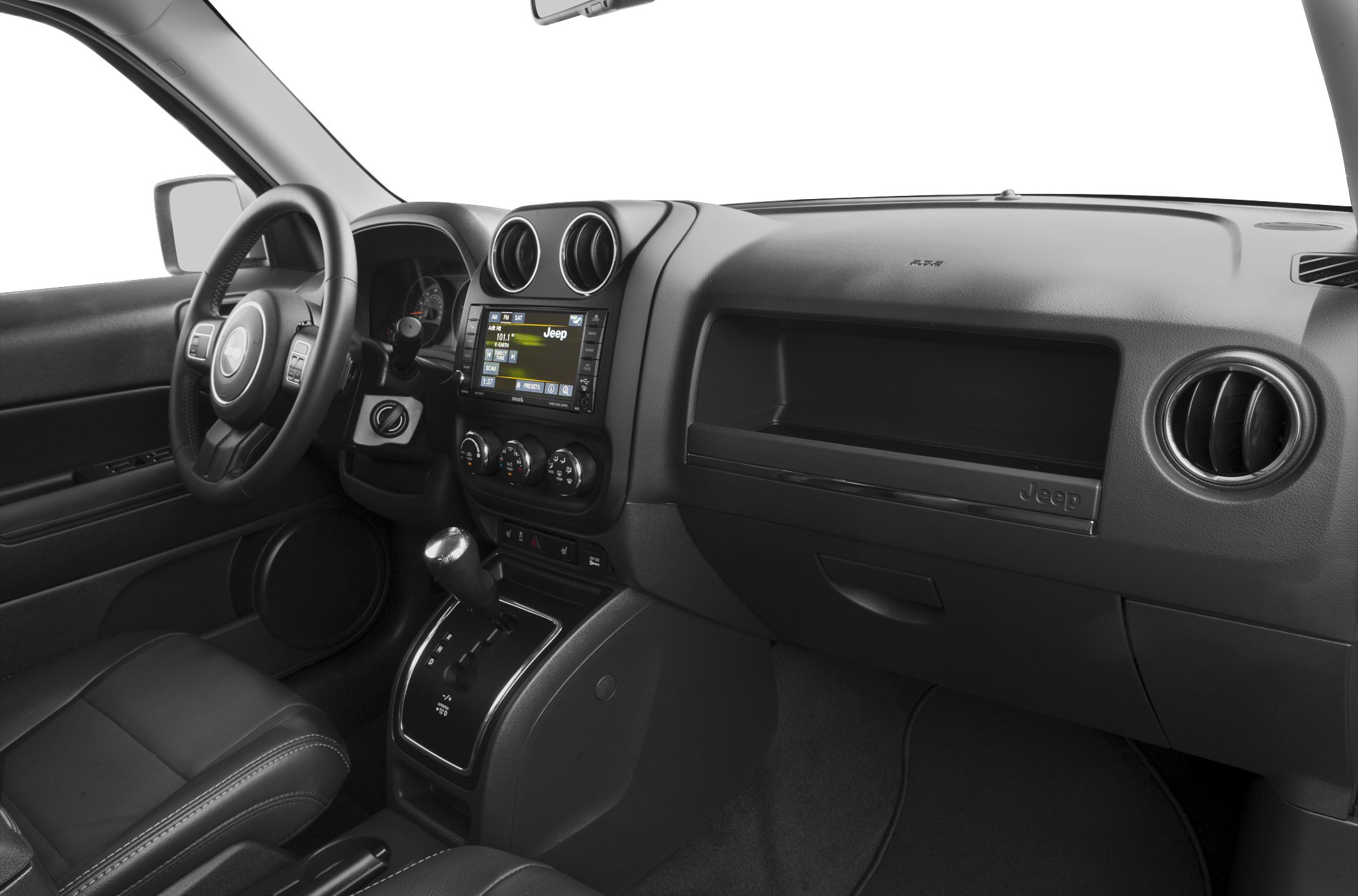 Dashboard with touchscreen, round vents, automatic shifter, leather seat