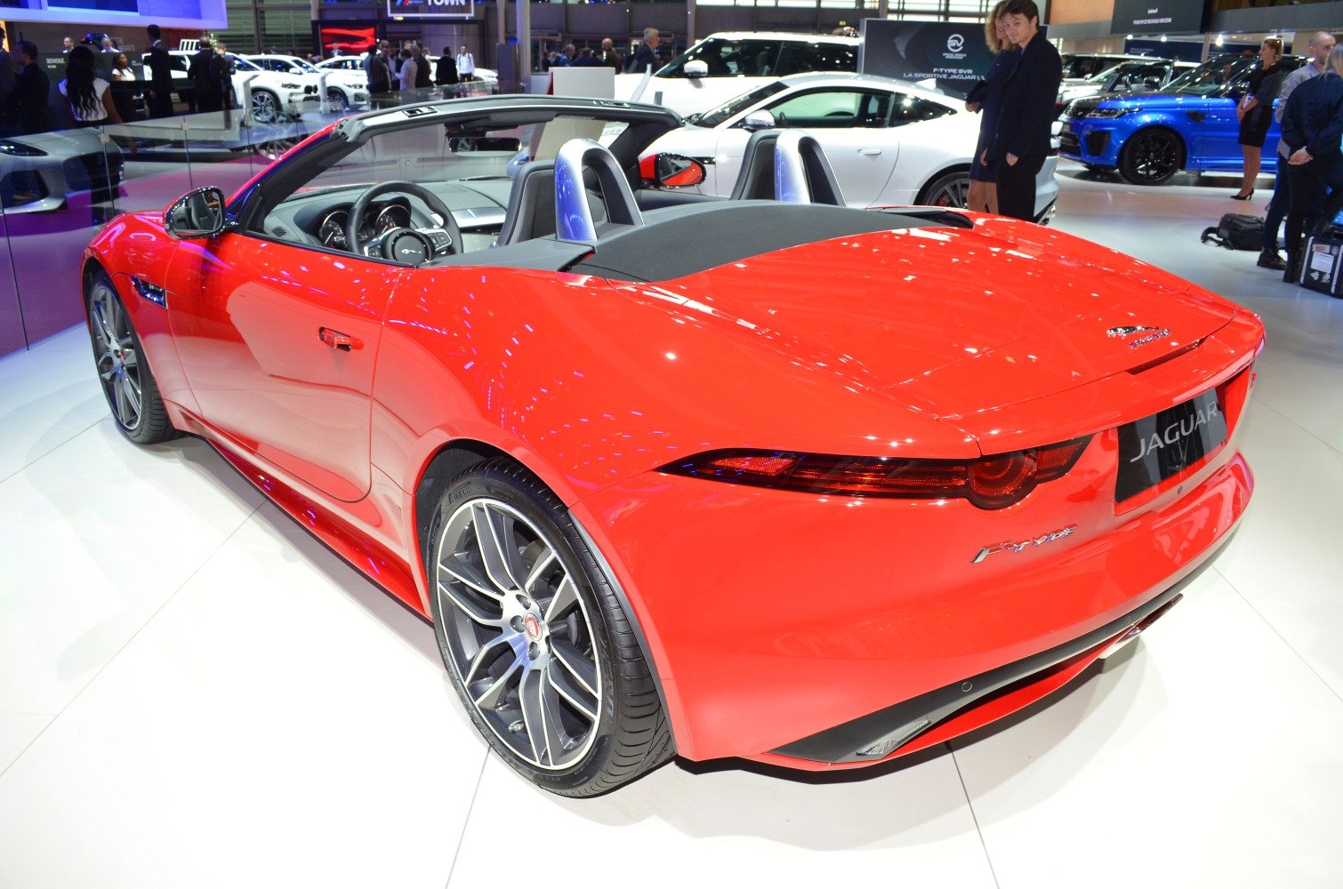 Red convertible with rear lights and alloy wheels