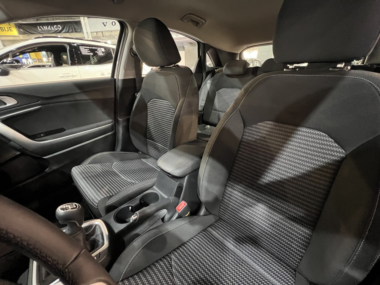 Interior front seats and center console with manual gear shift
