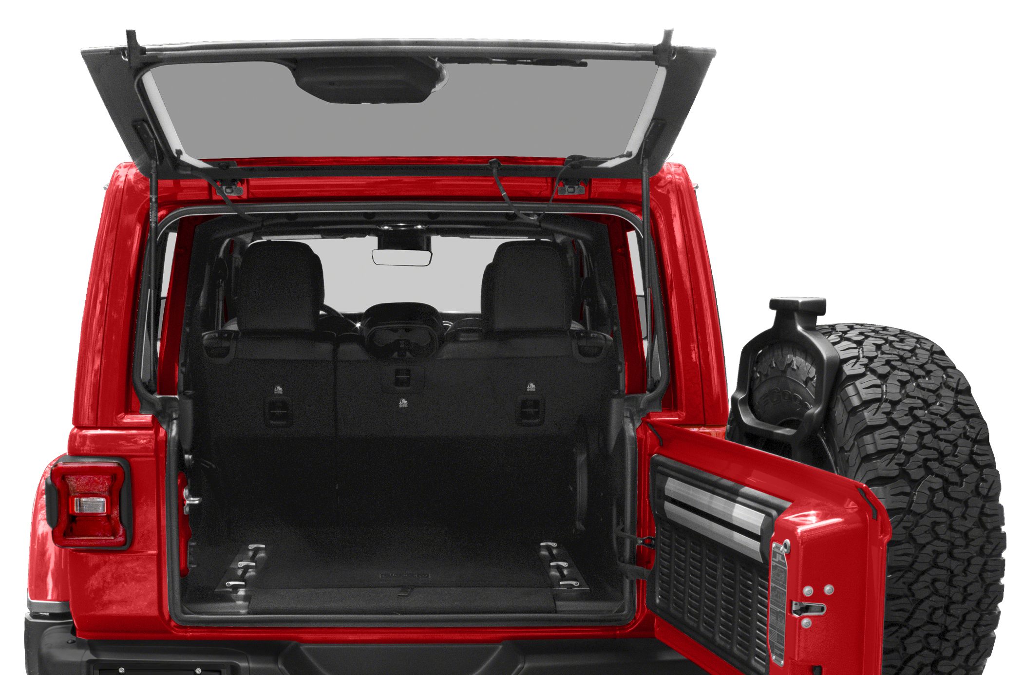 Open rear cargo area with spare tire mounted on door.