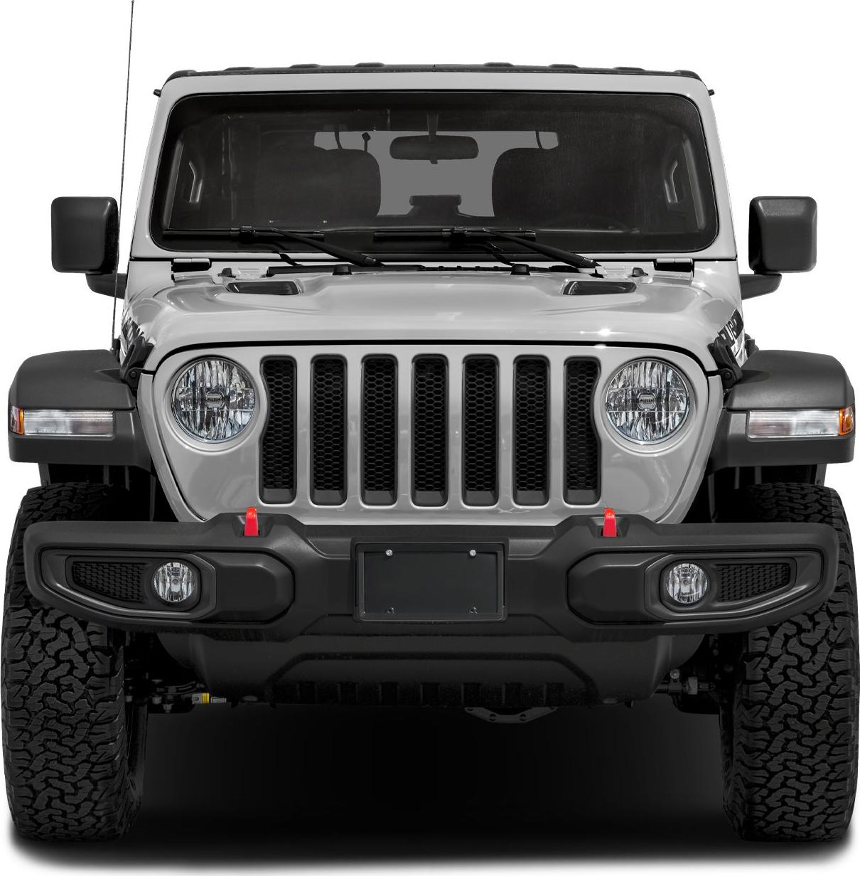 Front view with seven-slot grille, round headlights, rugged bumper, and wide off-road tires