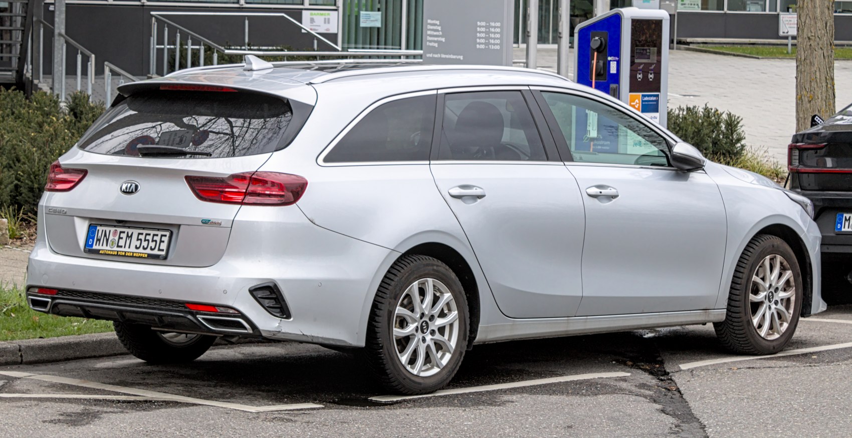 Rear and side profile with tail lights and alloy wheels