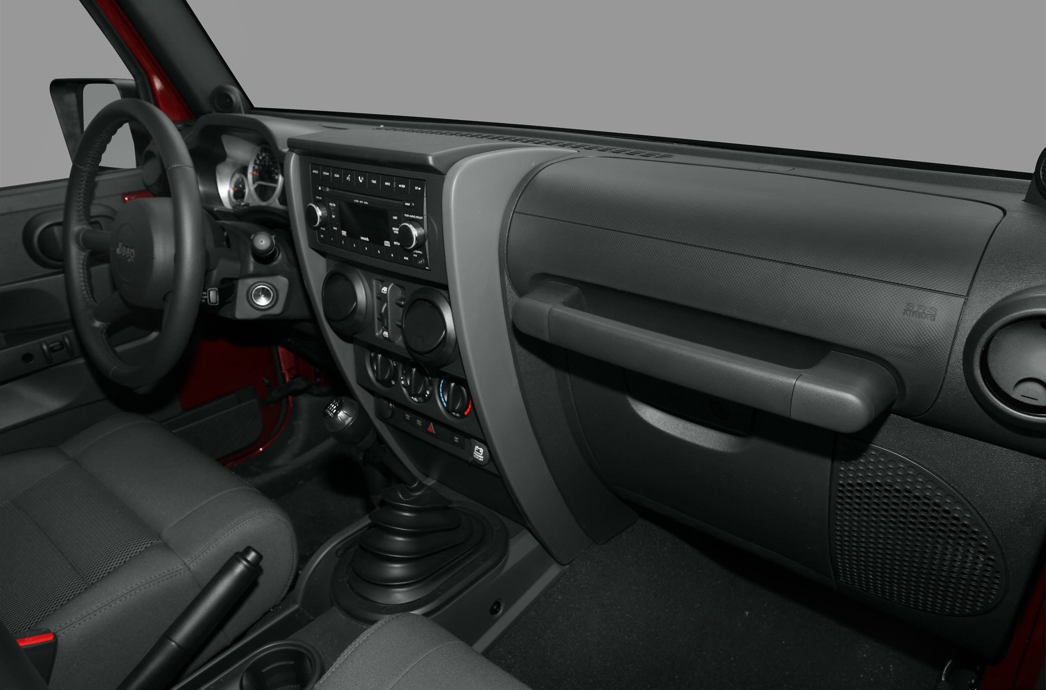 Dashboard and interior with manual gear shift and steering wheel