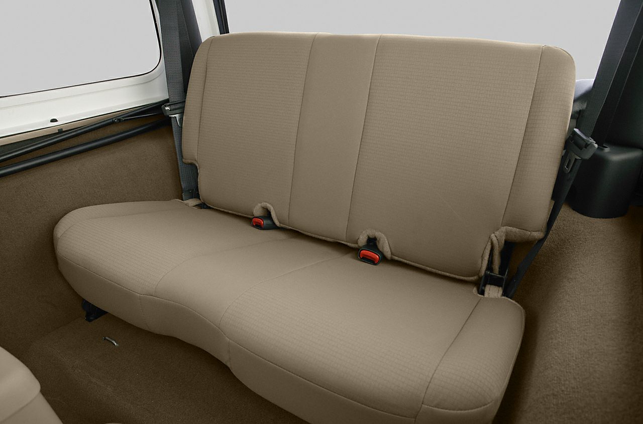 Beige rear bench seat with integrated seat belts