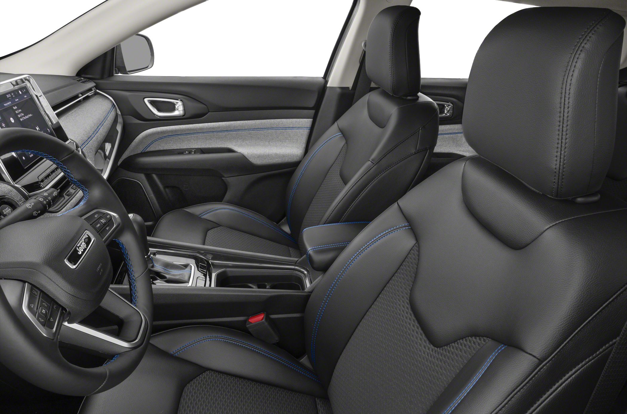 Black leather seats with blue stitching and modern SUV interior detailing.