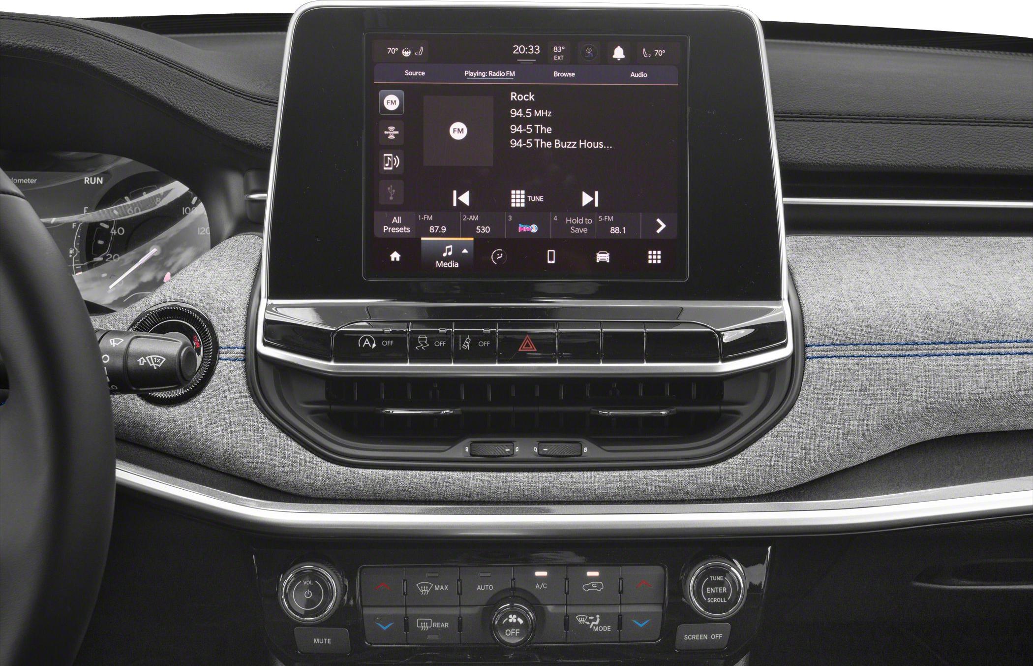Infotainment touchscreen and climate control panel with air vents