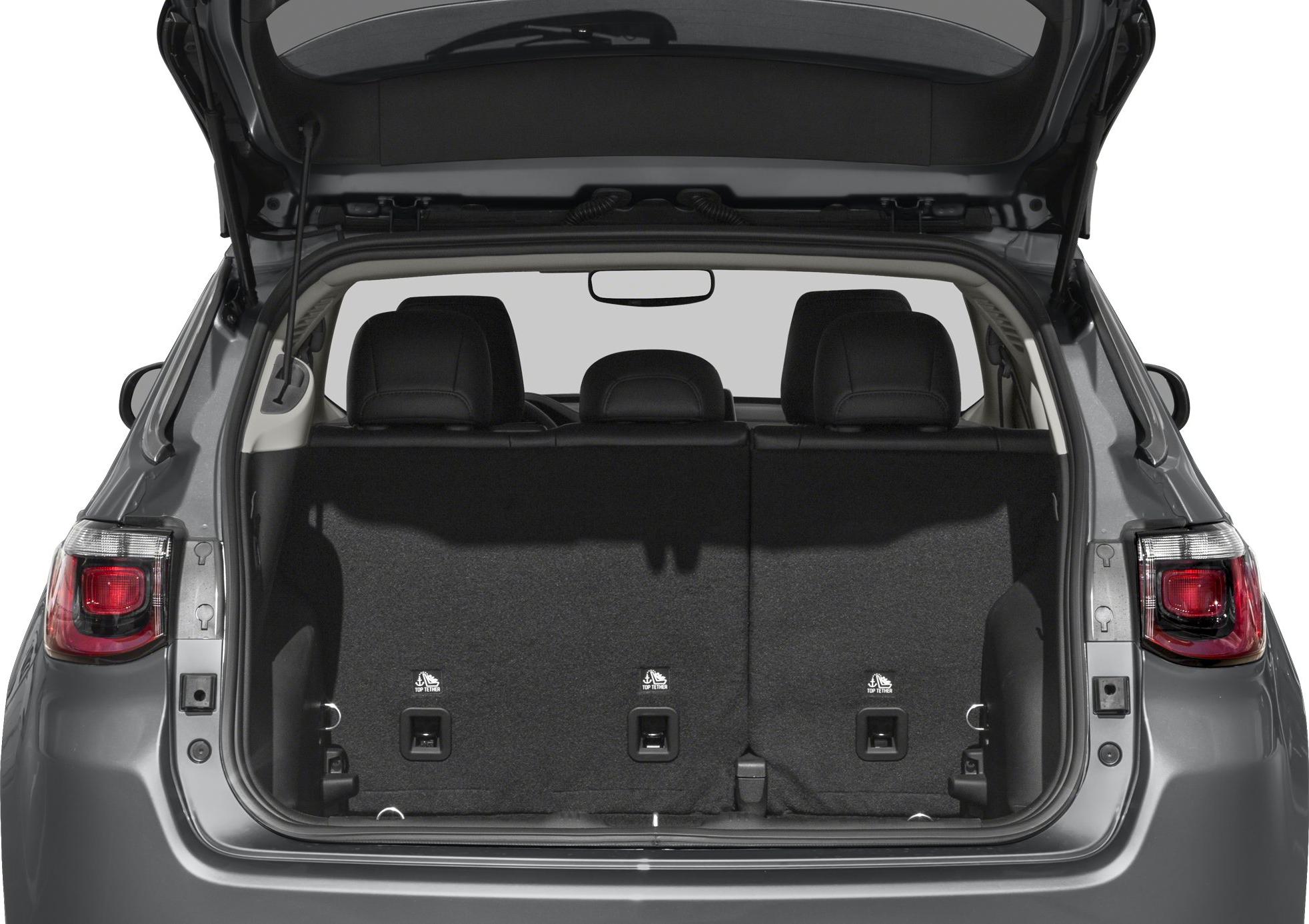 SUV rear trunk space with rear seats upright and open hatch