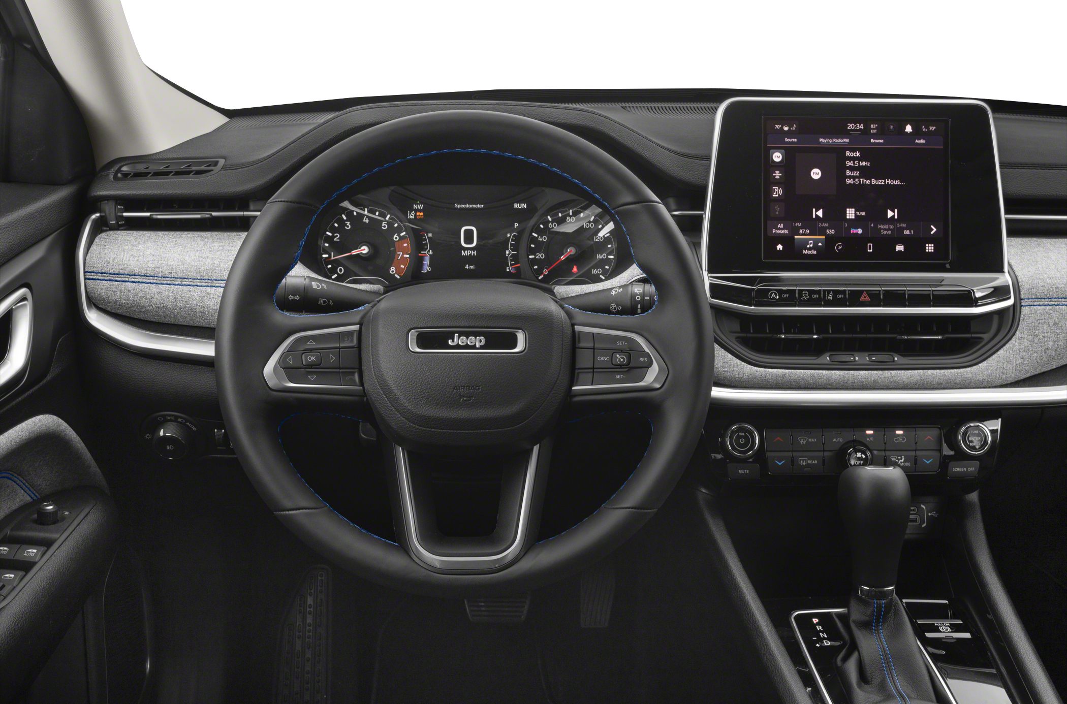 Digital instrument cluster and touchscreen infotainment in SUV interior
