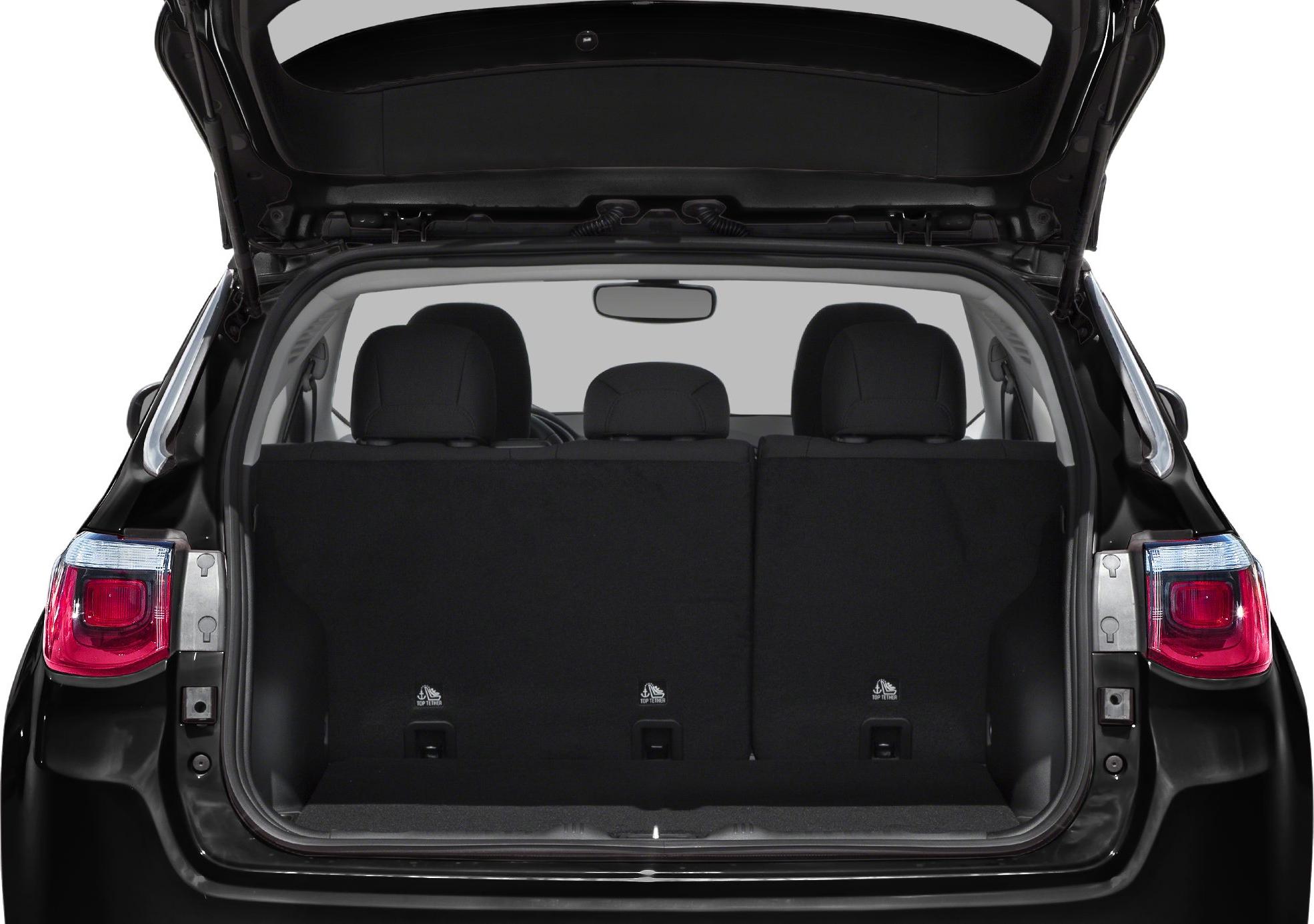 Open trunk with folded rear seats and visible rear headrests