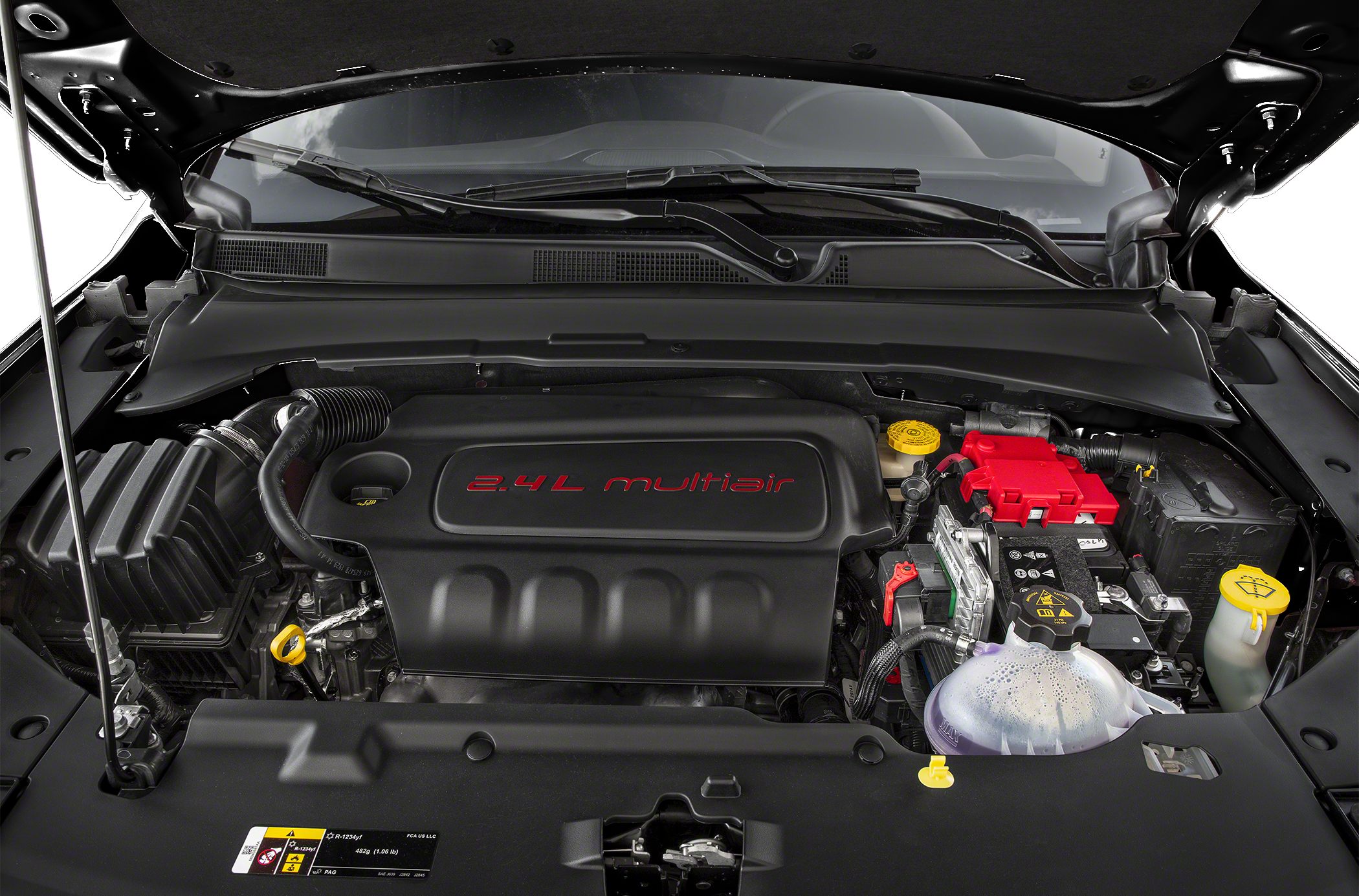 2.4L multiair engine with battery and fluid reservoirs.