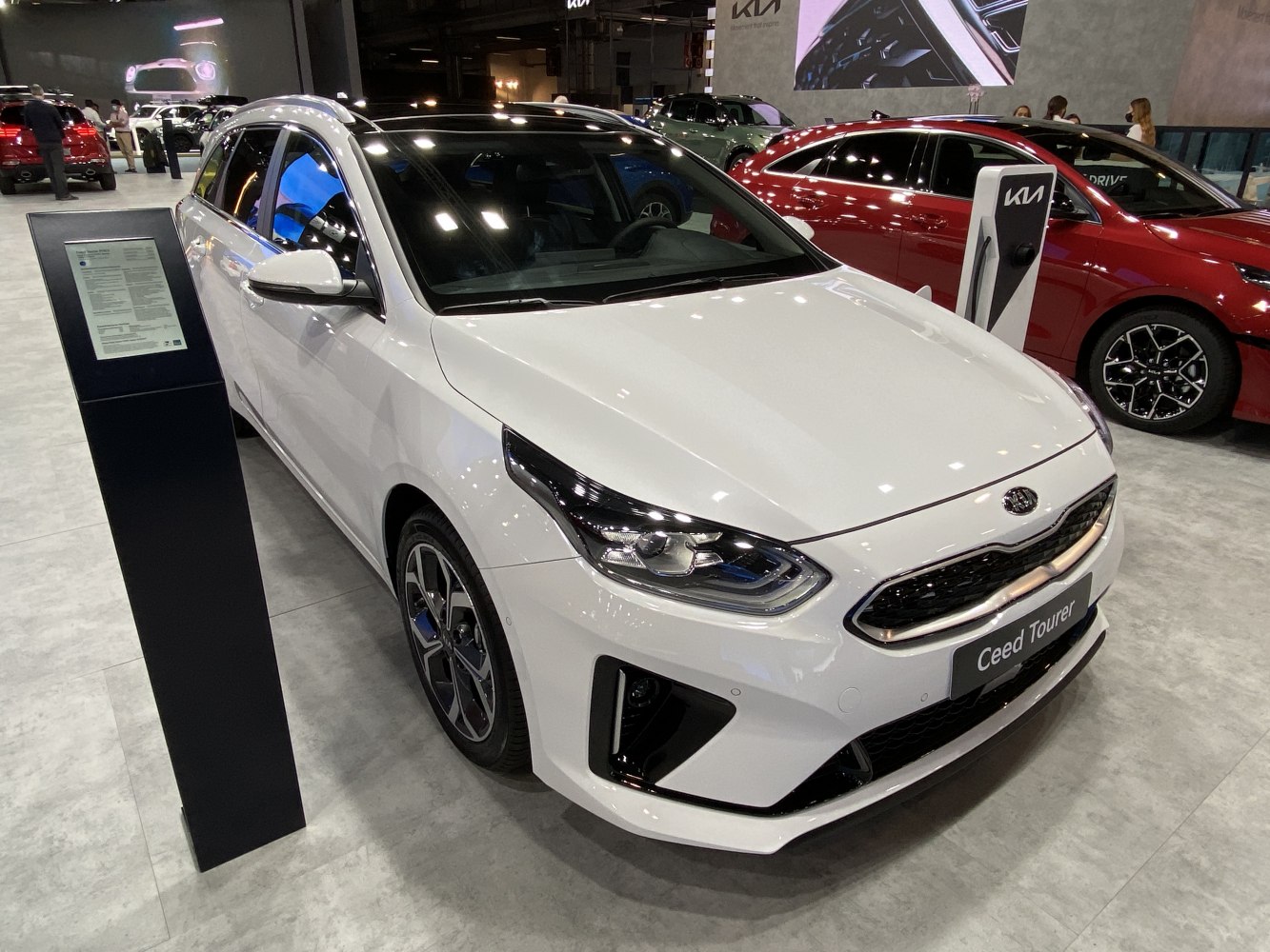 White compact sportswagon front with modern headlights and alloy wheels