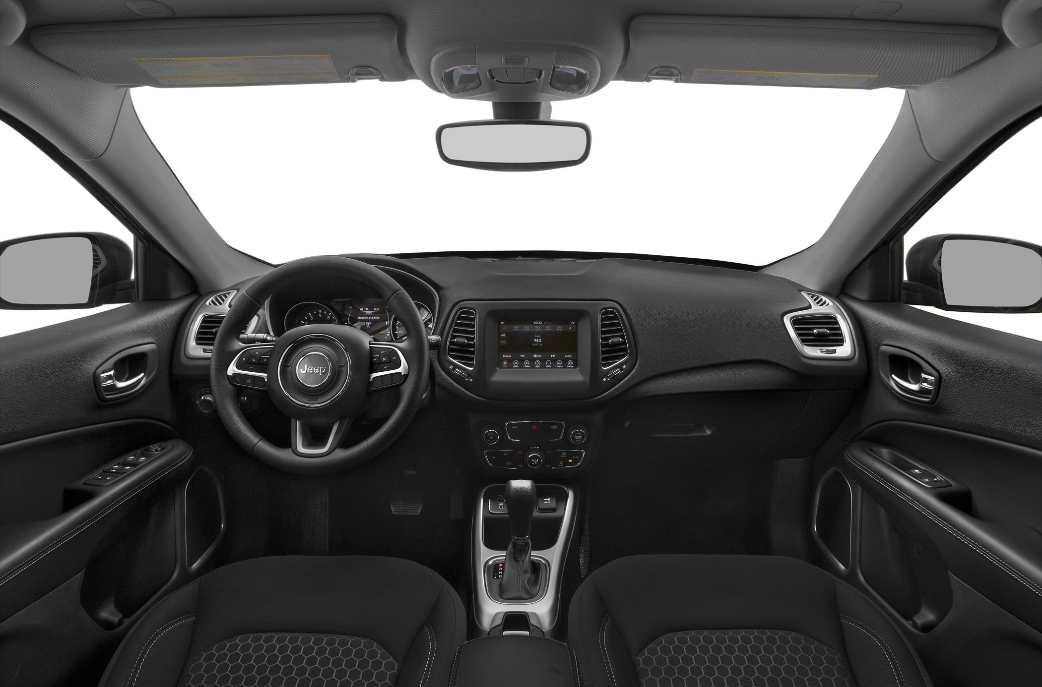 Dashboard and steering wheel view with touchscreen and gear shift