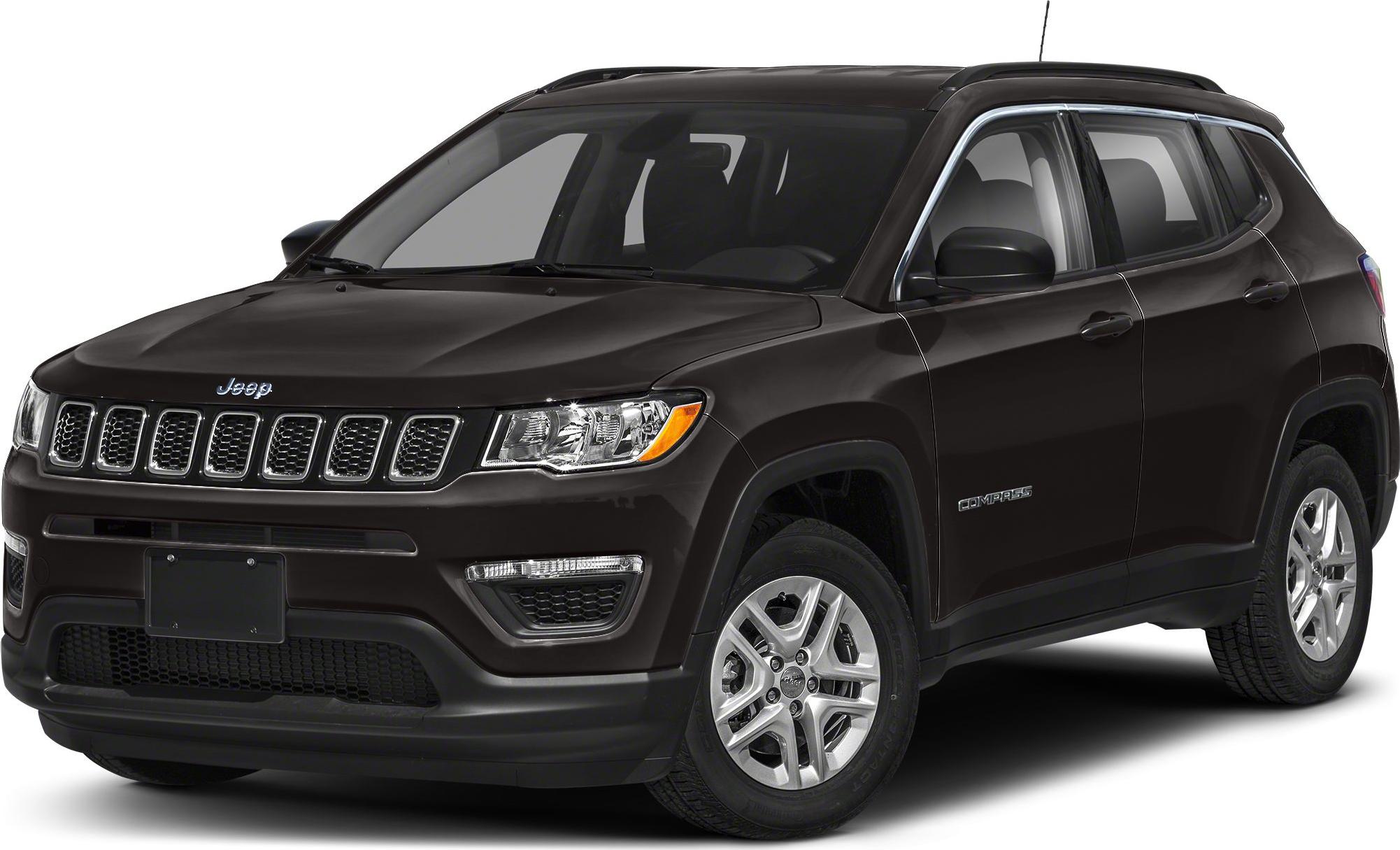 Front-side view of SUV with seven-slot grille and prominent headlights