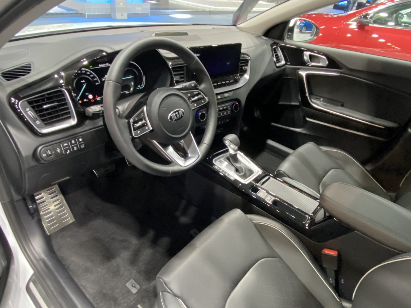 Dashboard, steering wheel, center console with gear shift in vehicle interior