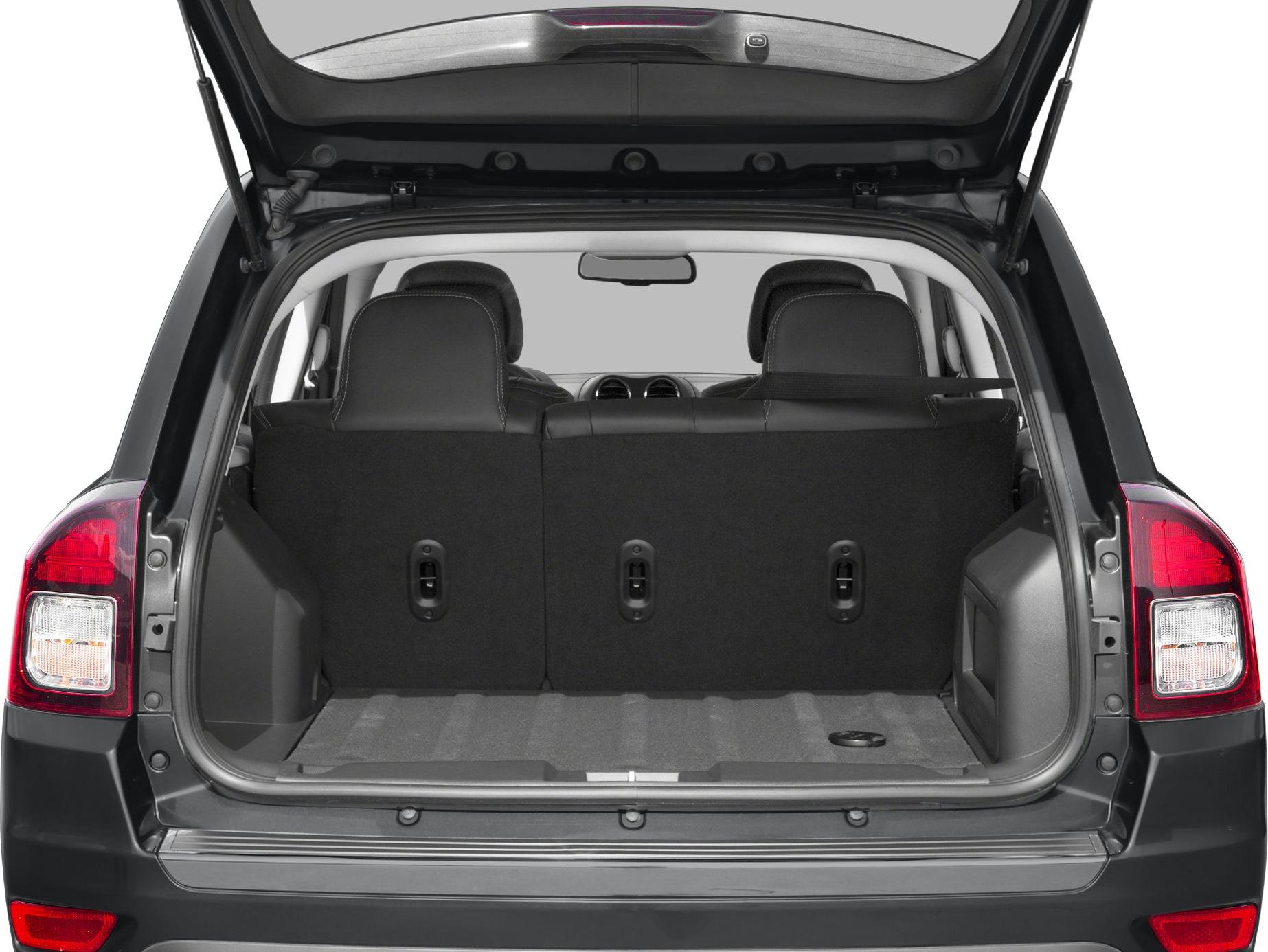 Open trunk with spacious cargo area and rear folded seats