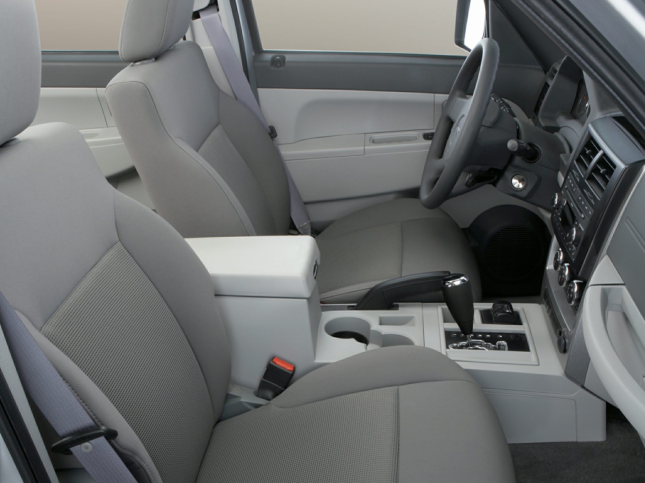 Front seats, center console, steering wheel, gear shifter.