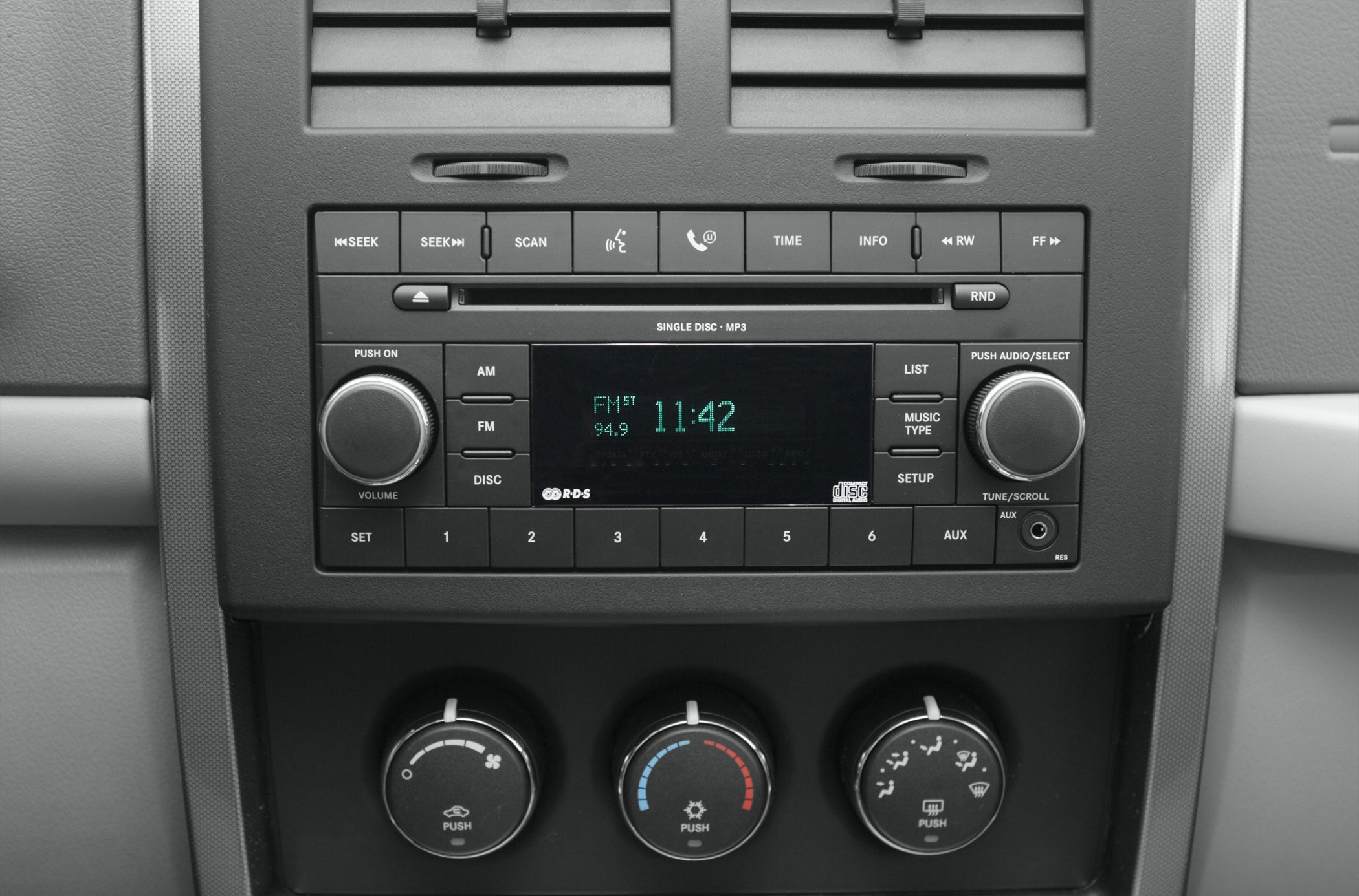 Audio system and climate control knobs console