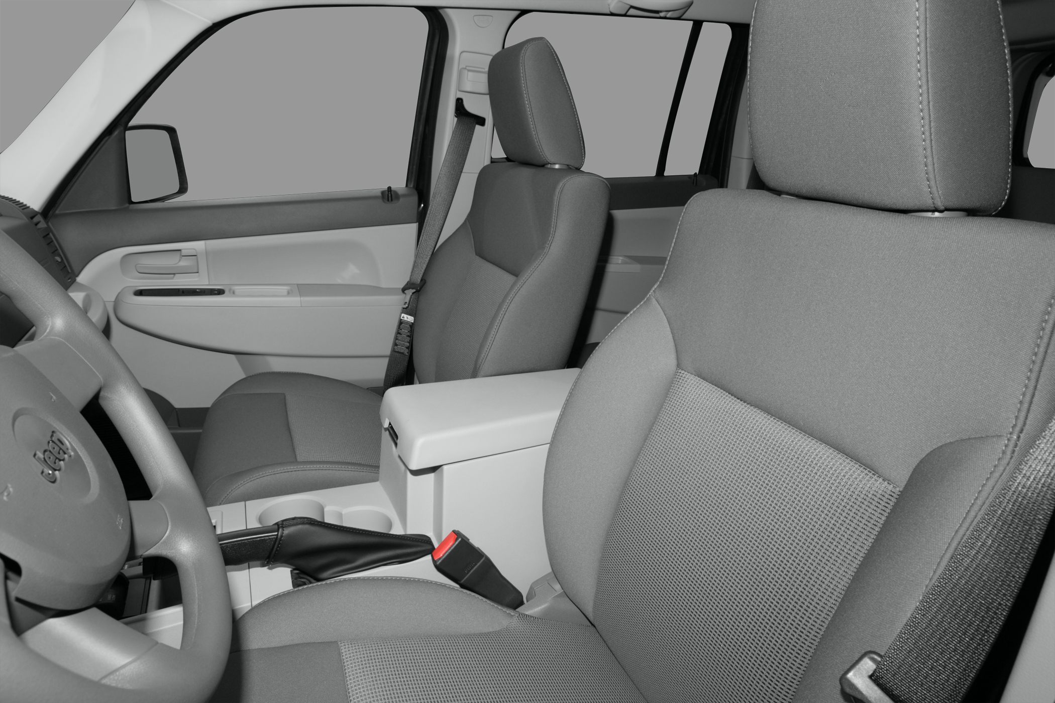 Front cloth seats and center console with armrest and cup holders